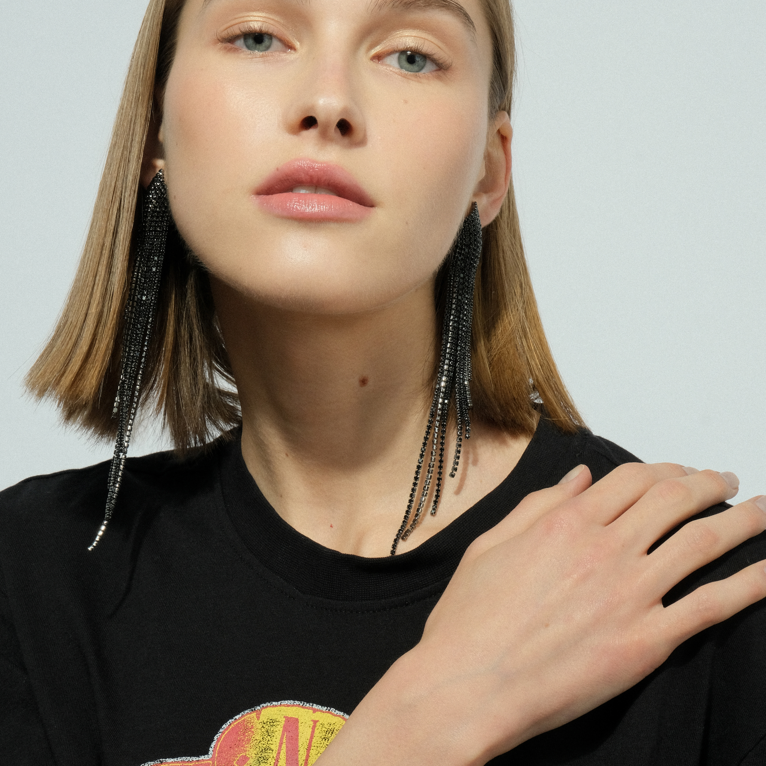 Black earrings completely covered with crystals