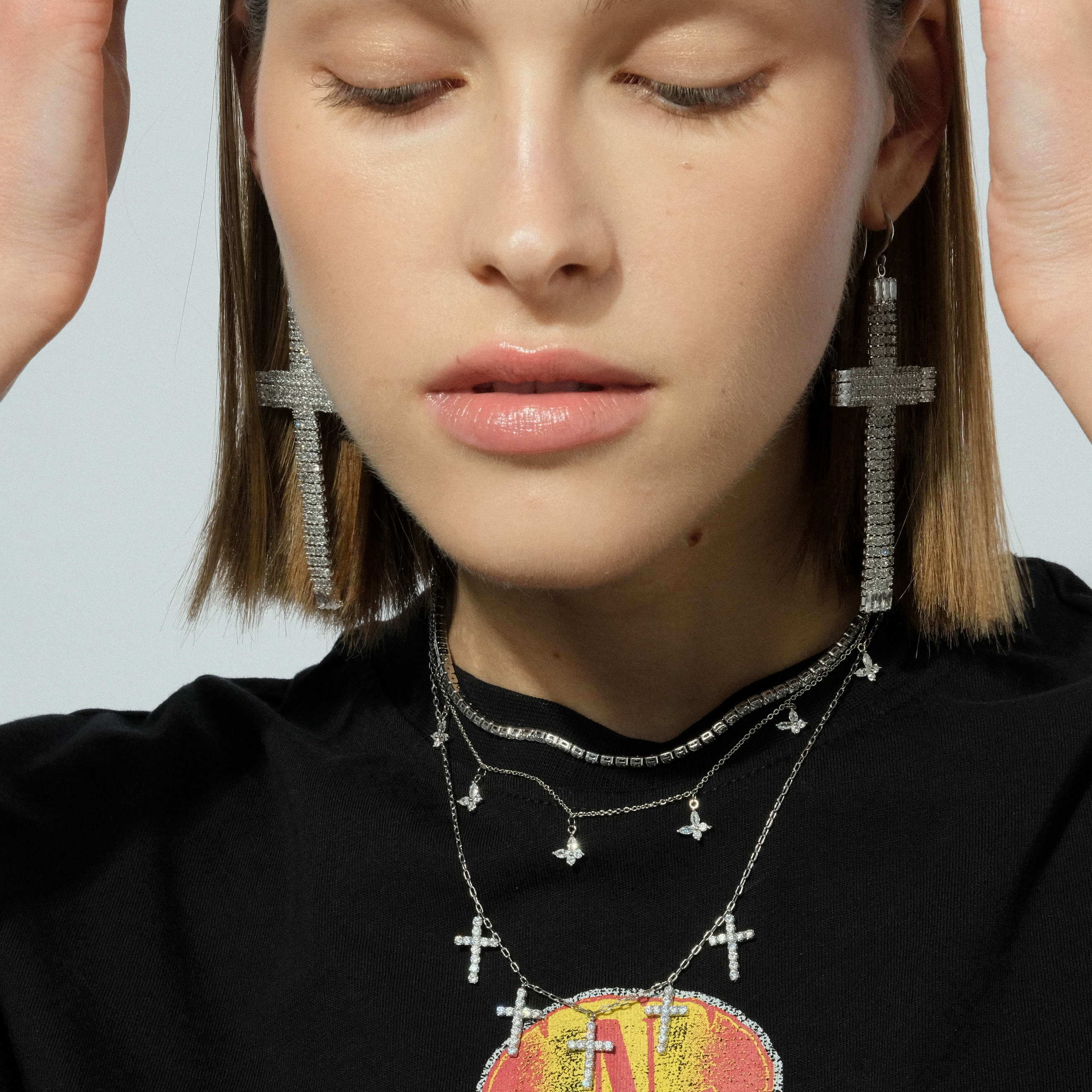 cross earrings completelcovered with crystals