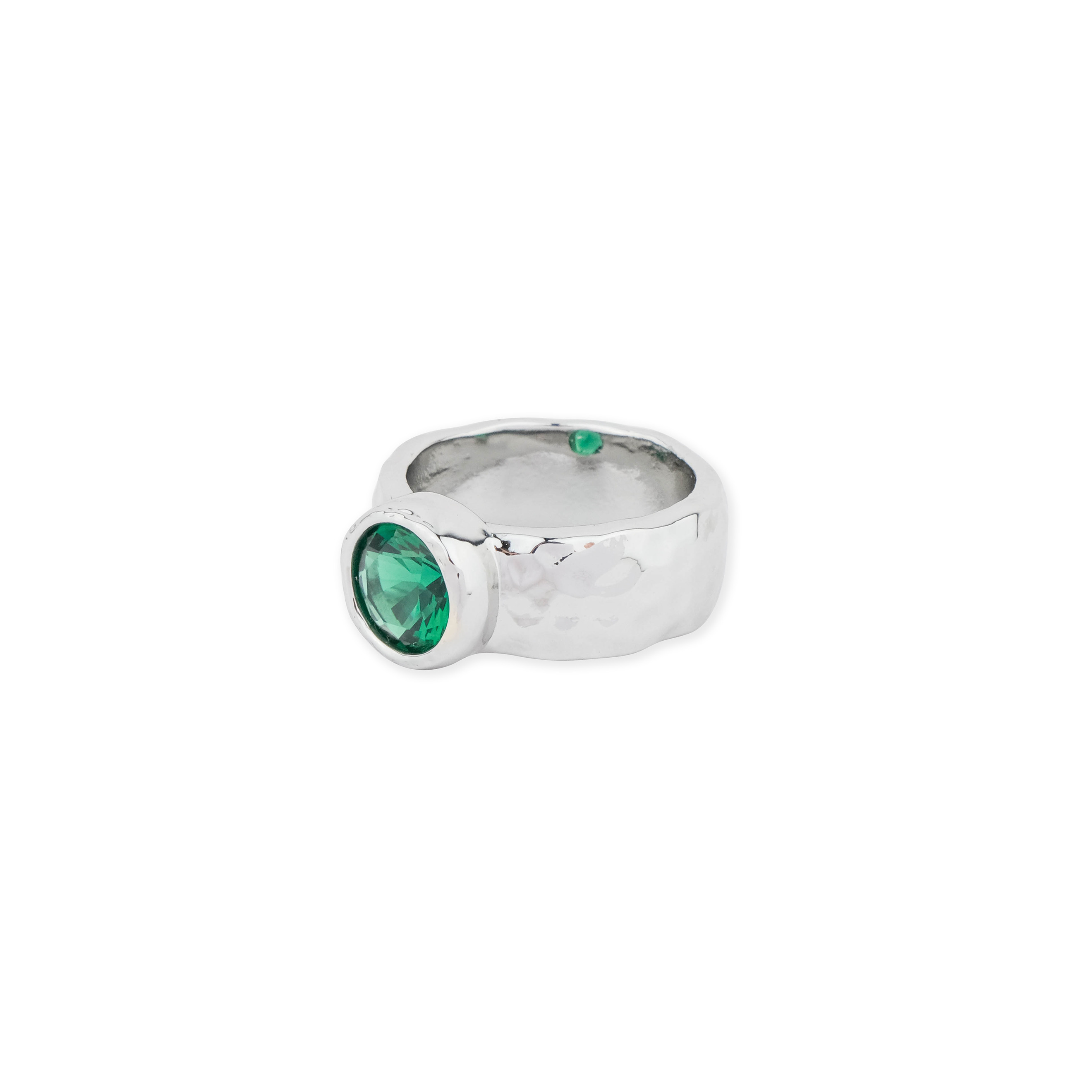 ring with a large green crystal