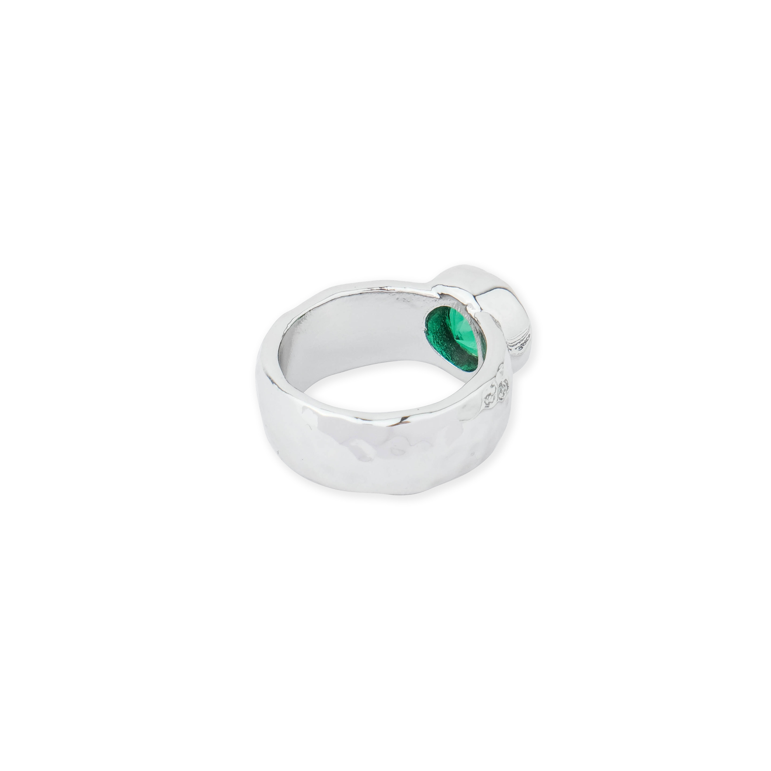 ring with a large green crystal