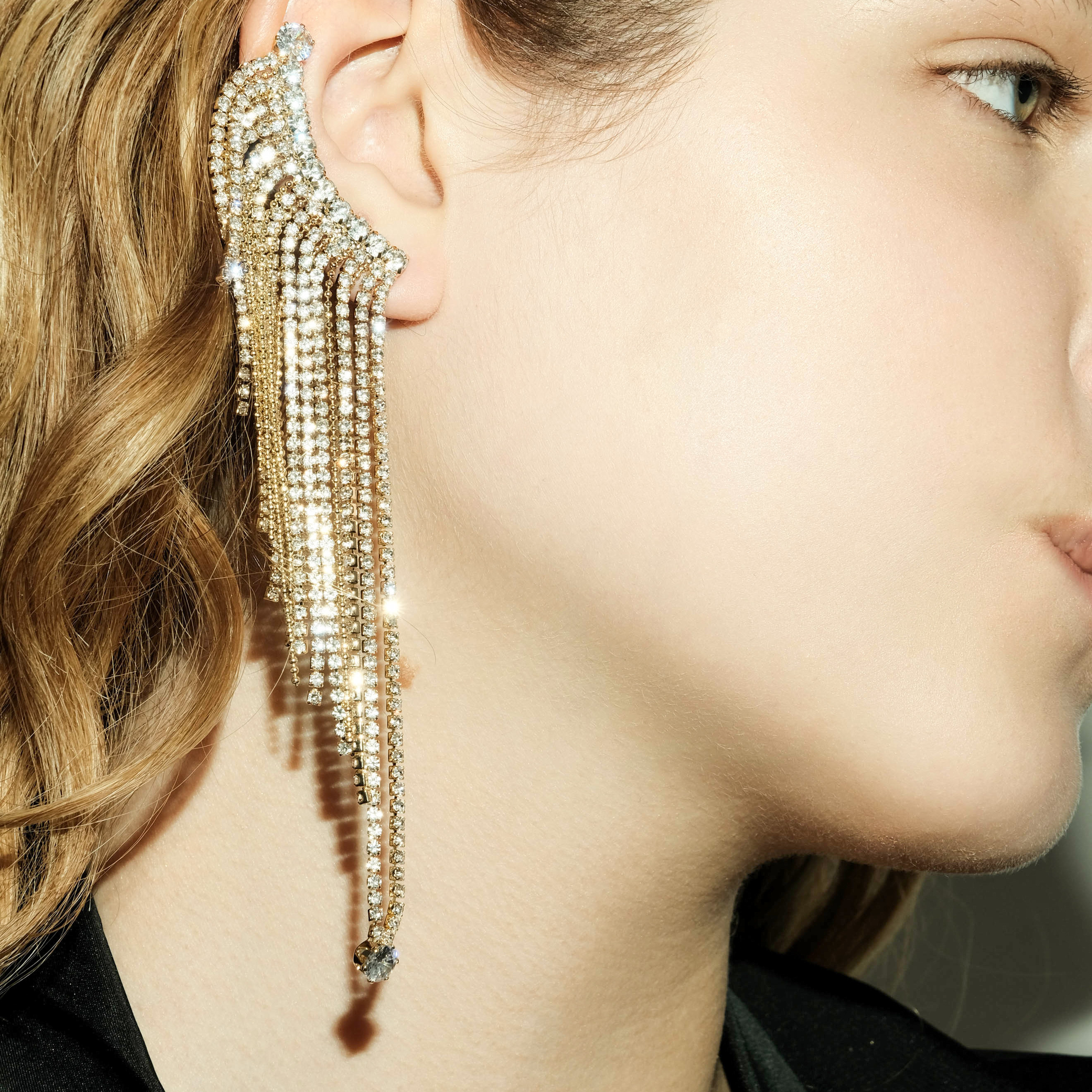 cuff with long chains covered with crystals