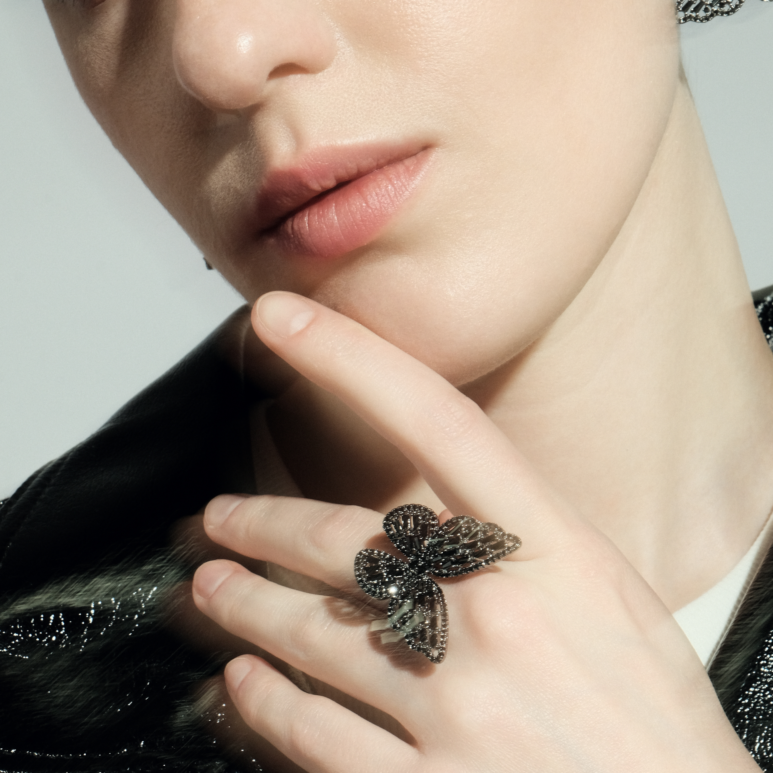 Blackened butterfly ring with crystals