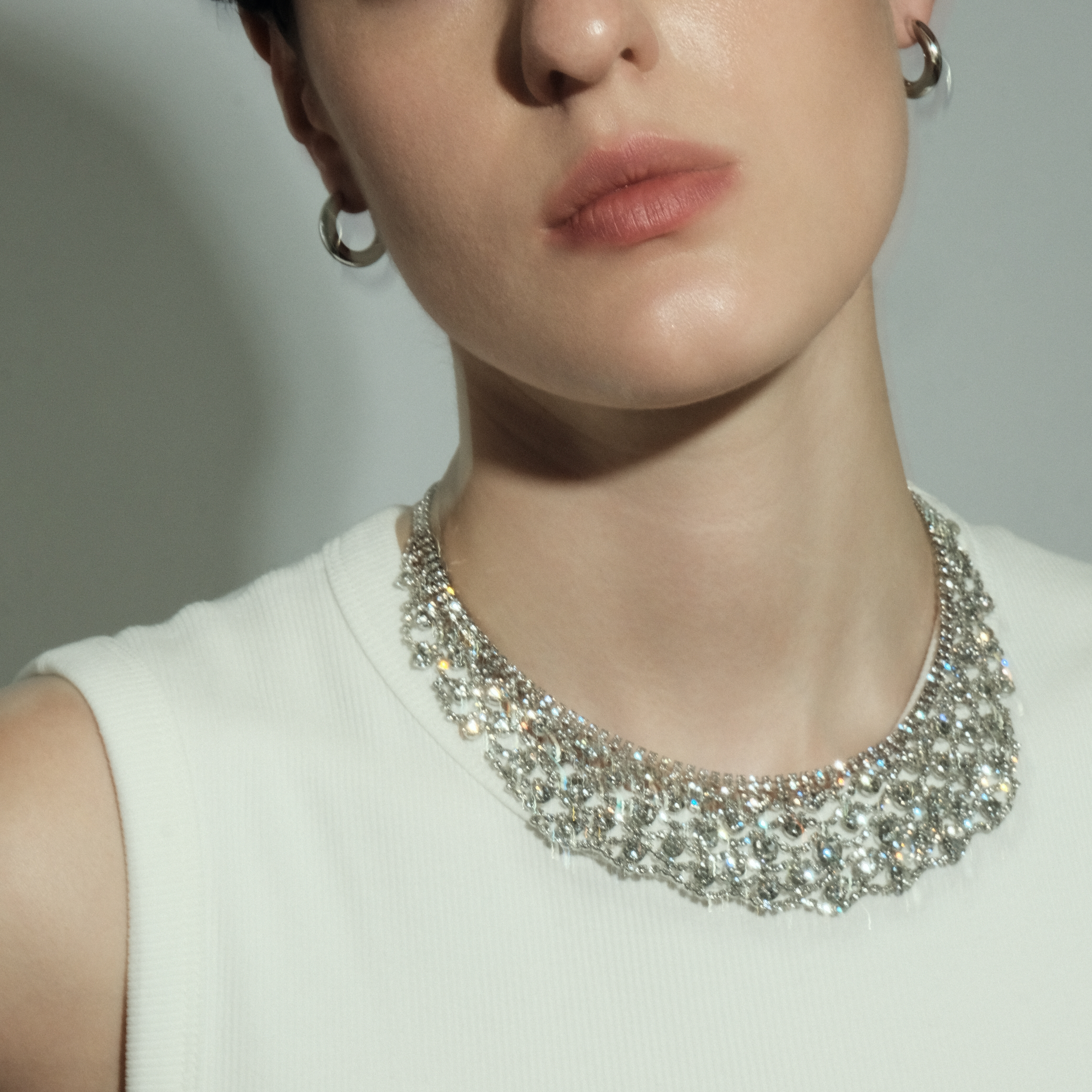 Wide  necklace with crystals of different sizes