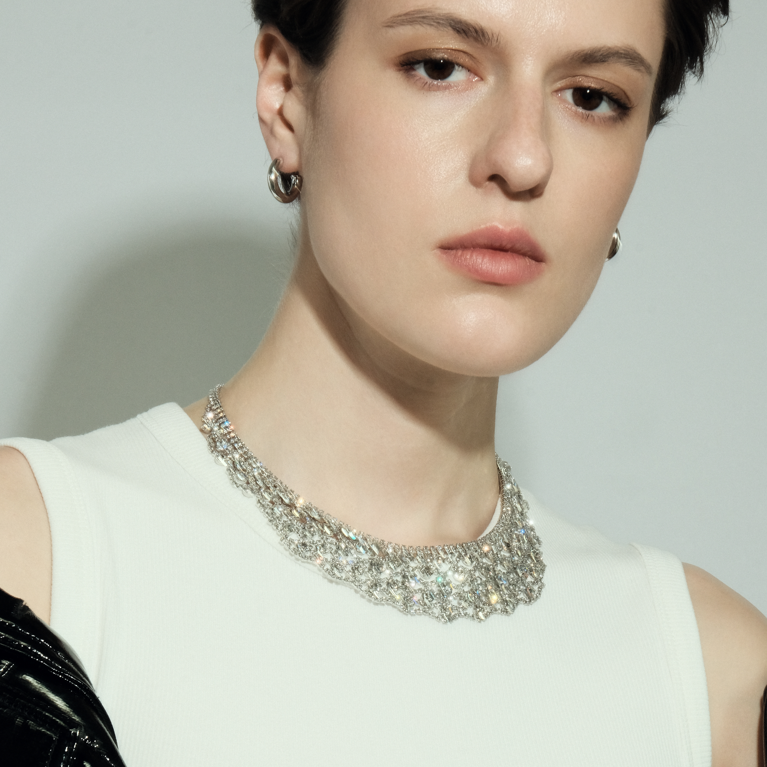 Wide  necklace with crystals of different sizes