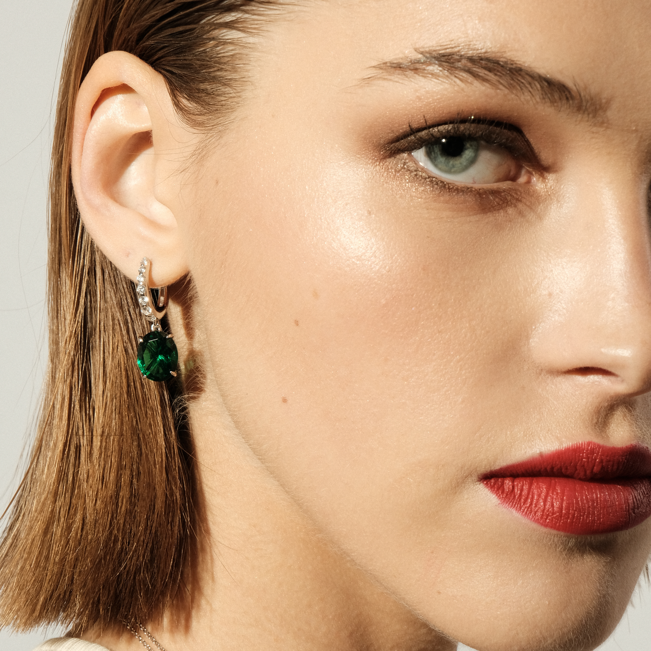 Earrings made of silver with green crystal