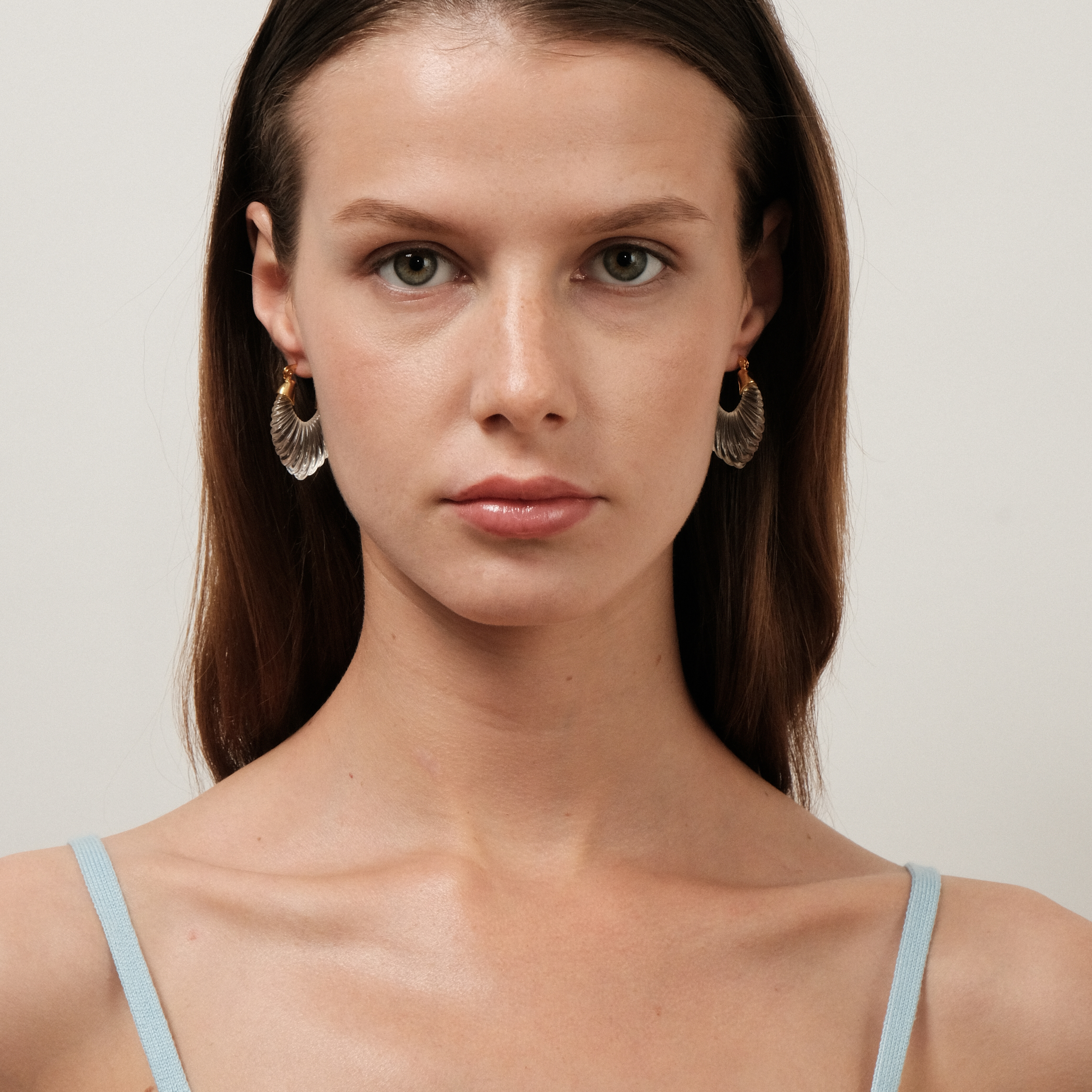 earrings with a curly white insert