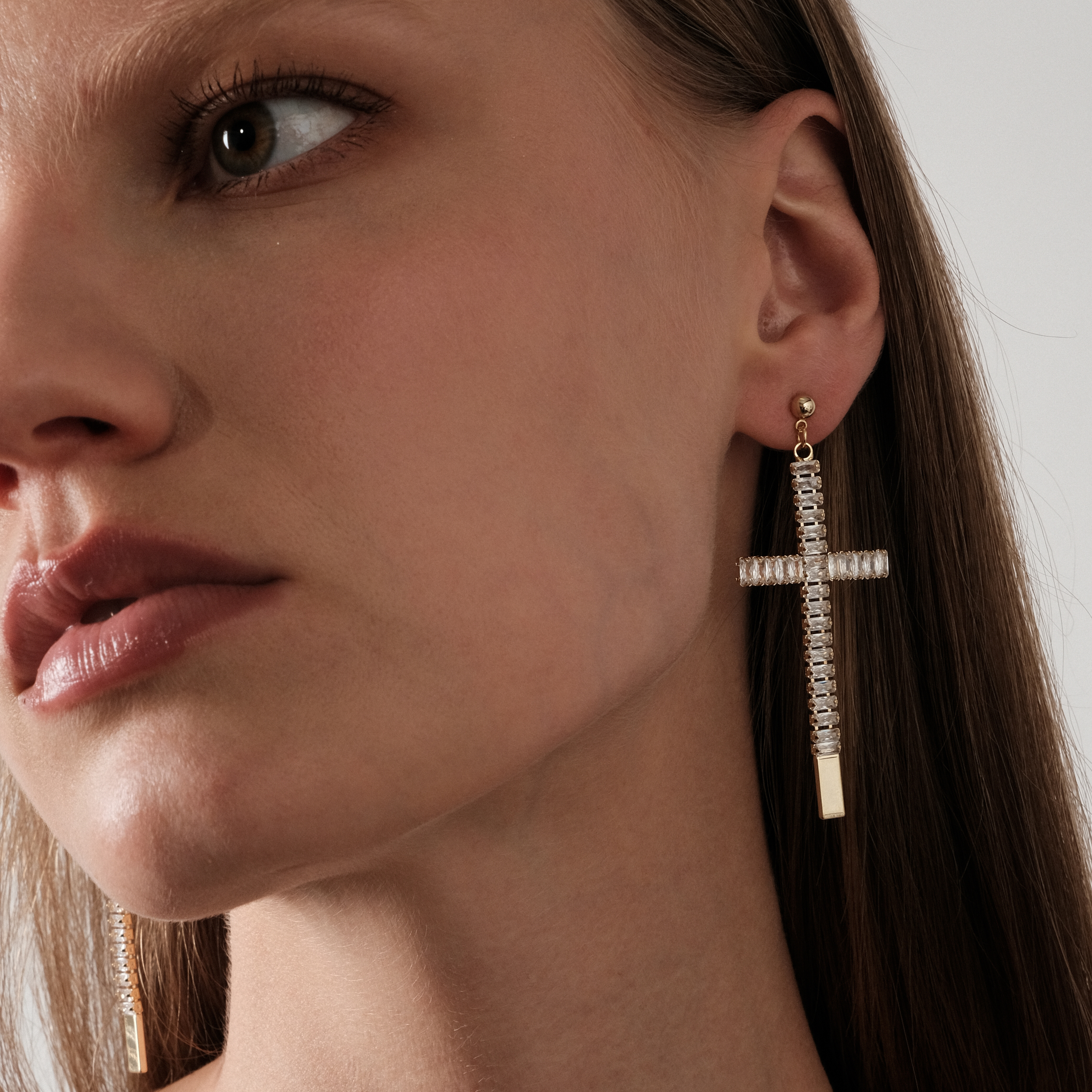 cross earrings completely covered with crystals