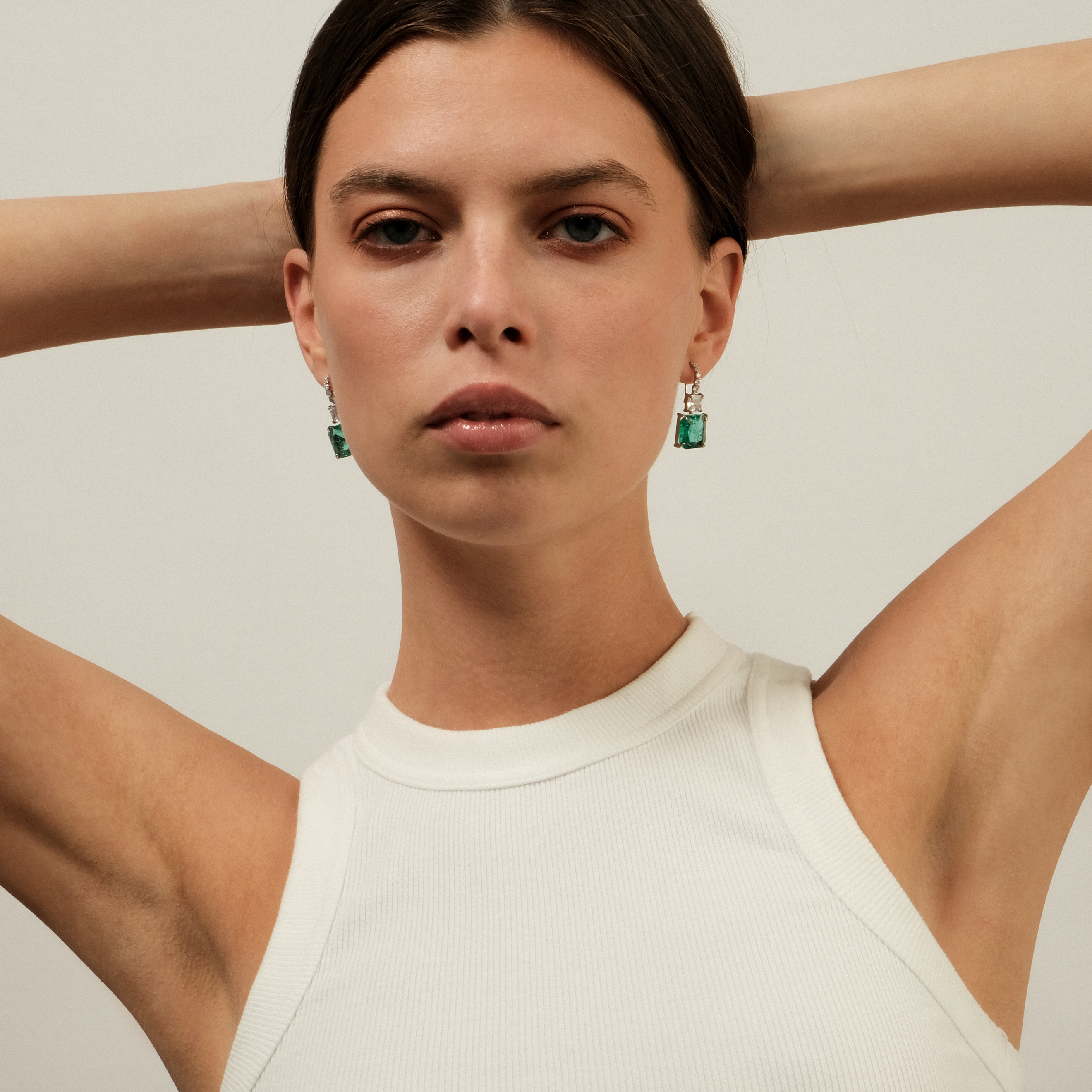 Silver earrings with green crystal