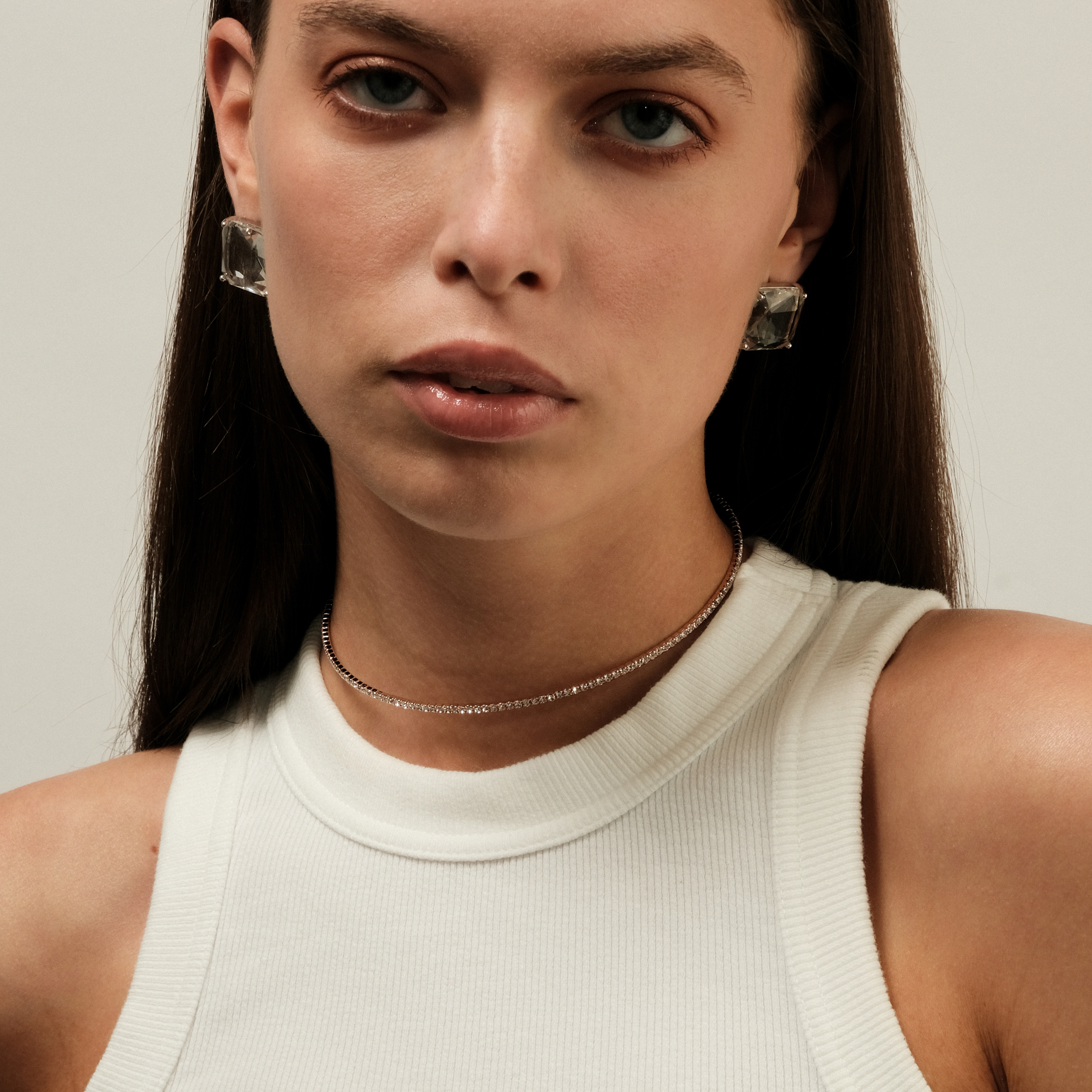 earrings with a large square crystal