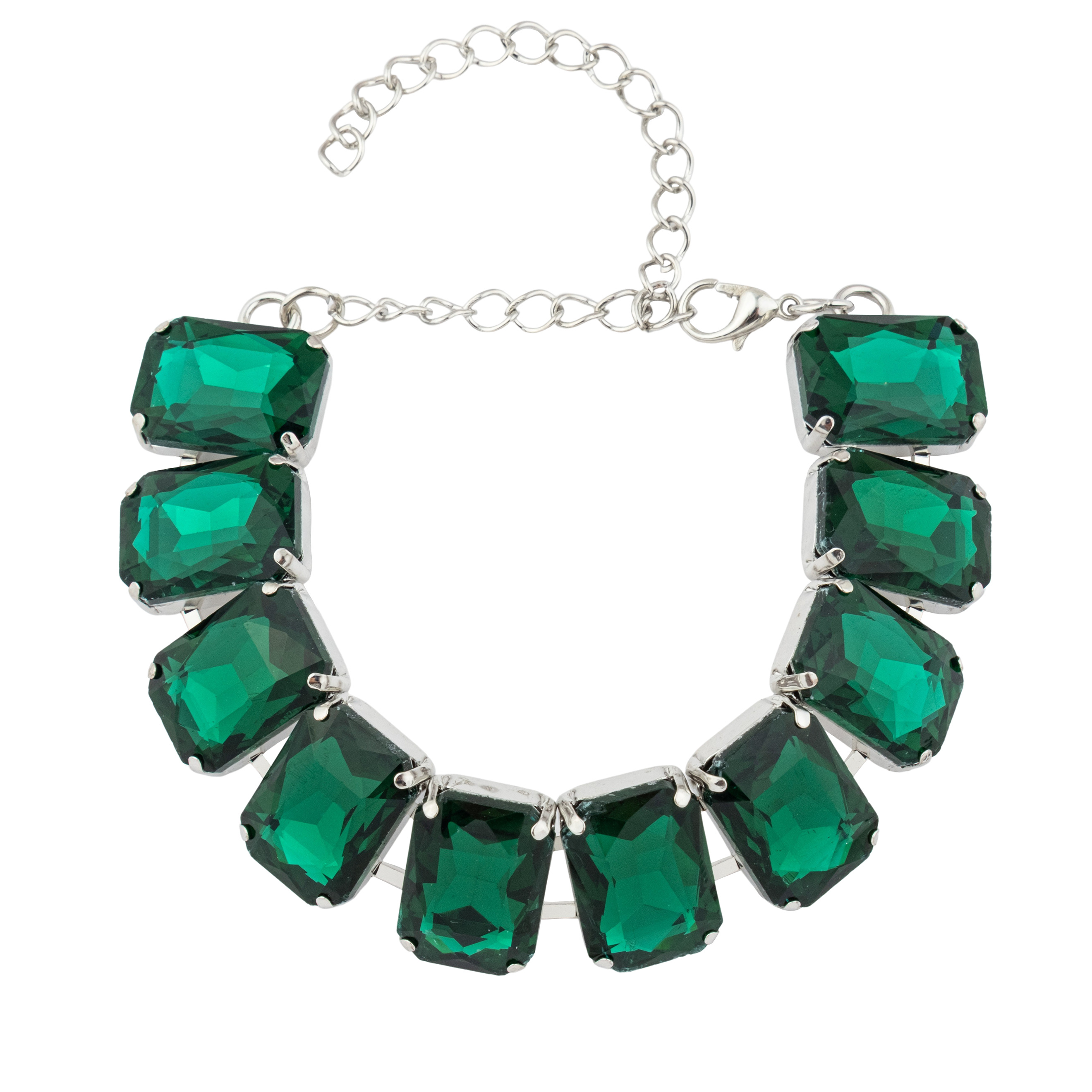 Silver bracelet with large green crystals