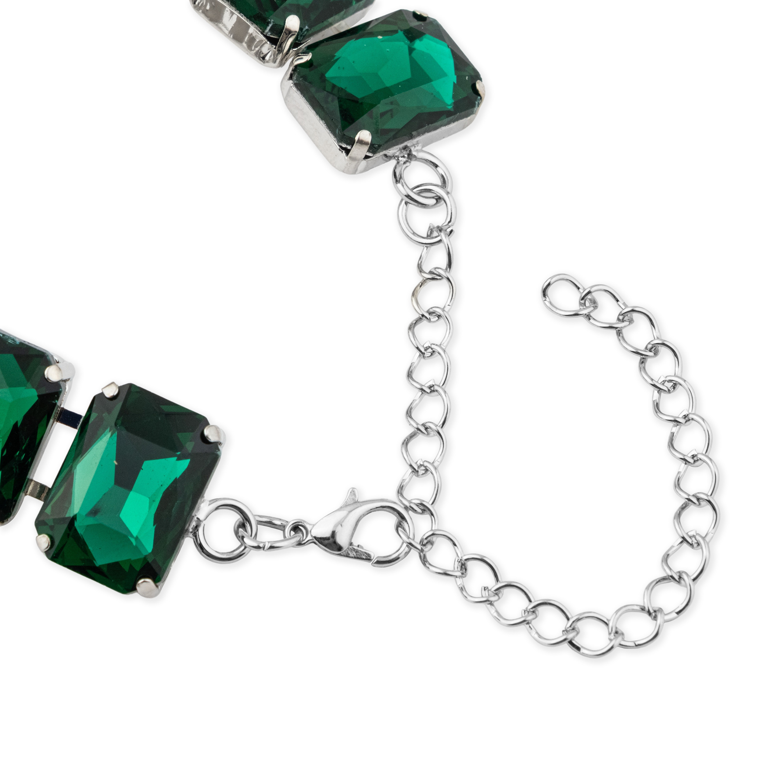 Silver bracelet with large green crystals