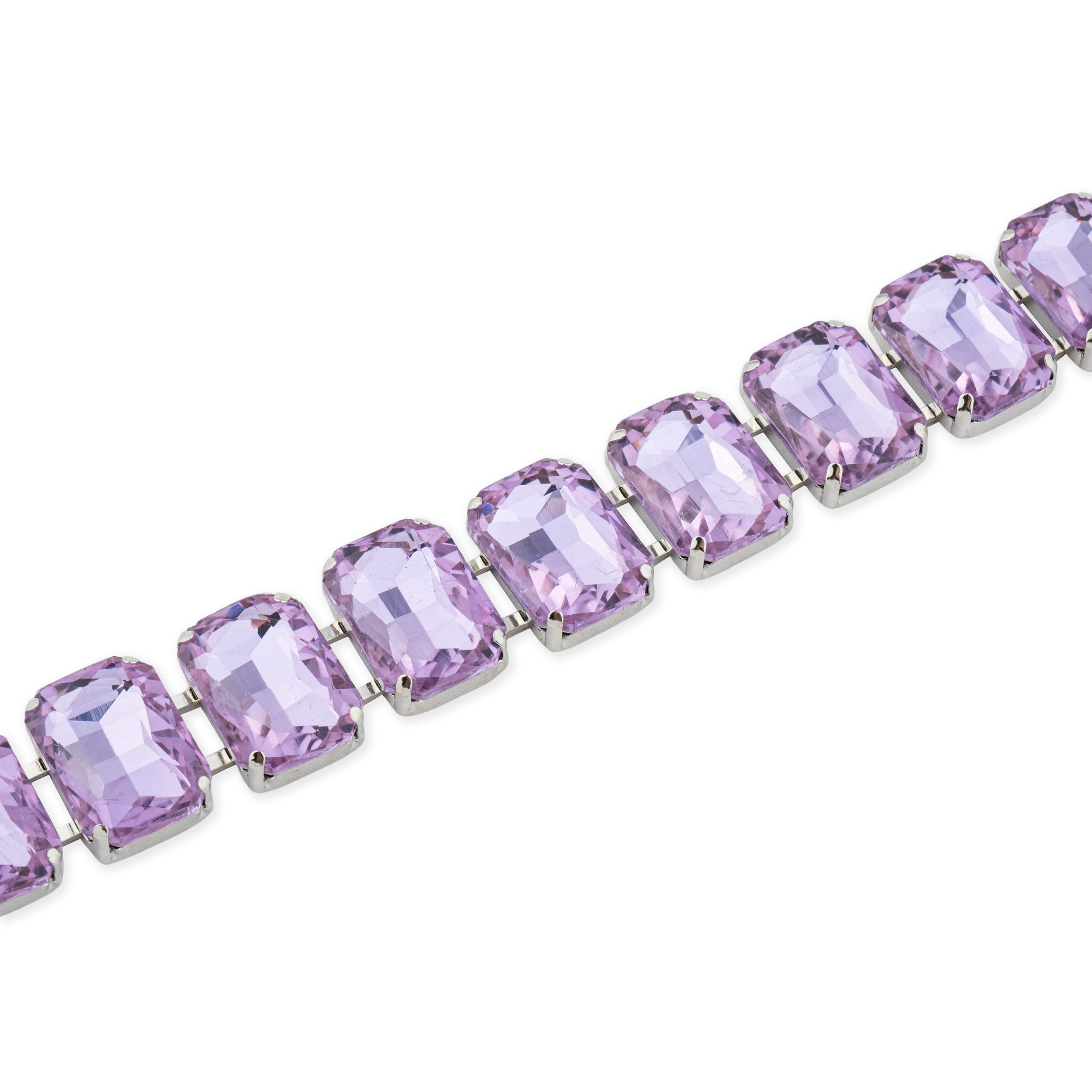 Silver bracelet with large purple crystals