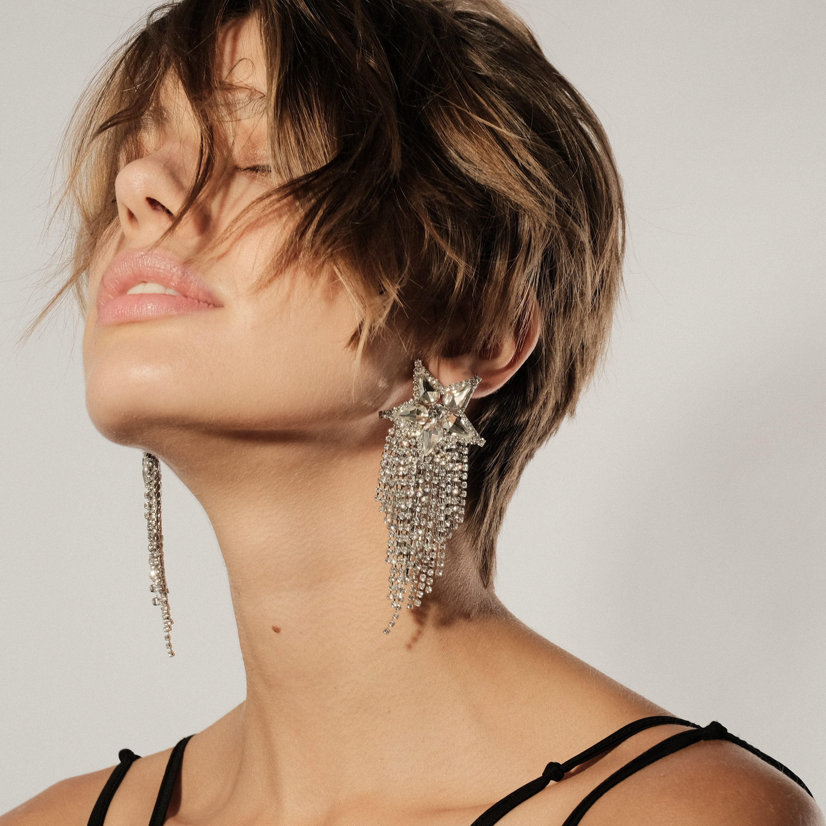 star earrings completelcovered with crystals
