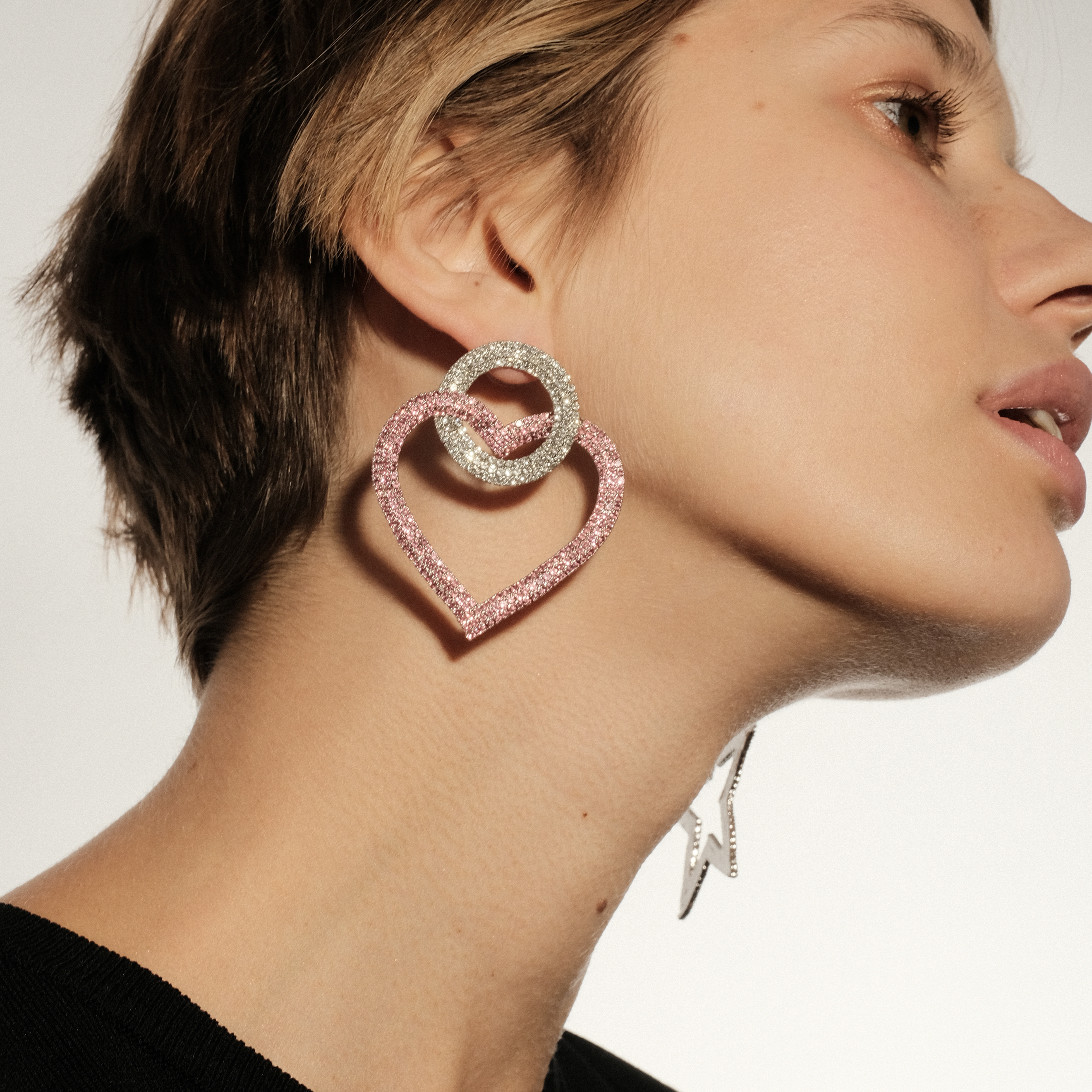 earrings with pink hearts completelcovered with crystals