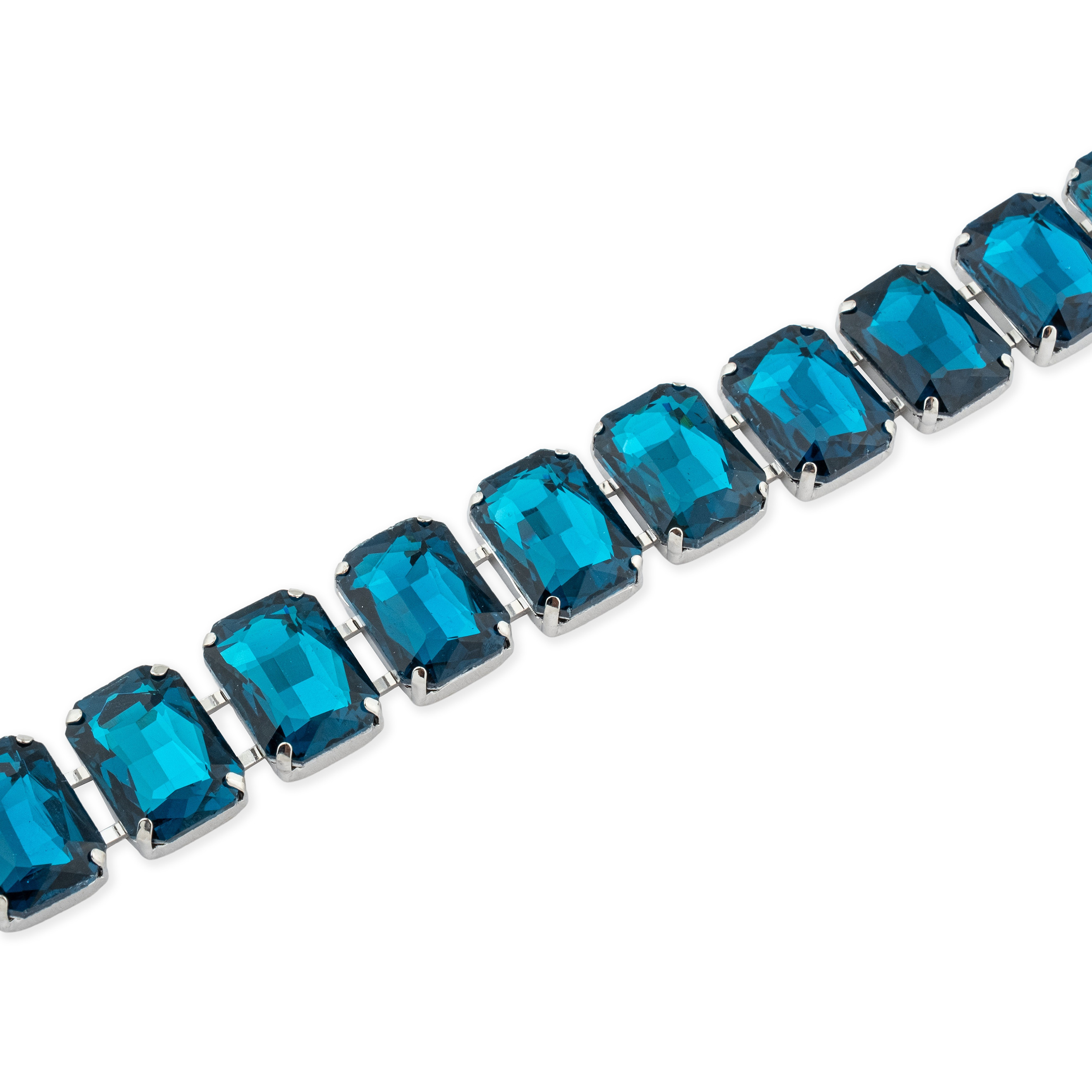 Silver bracelet with large blue crystals