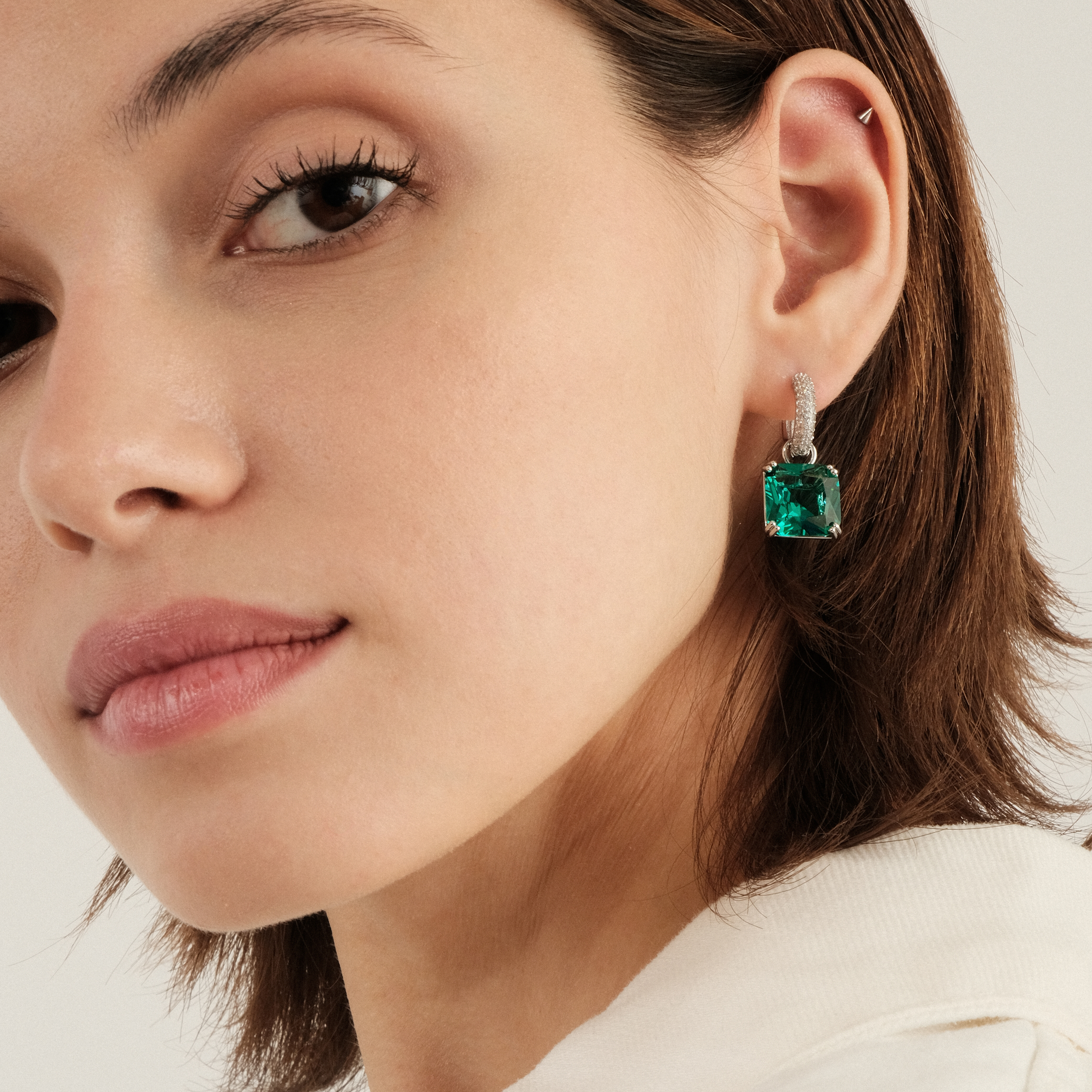 earrings with square green crystal and peacock