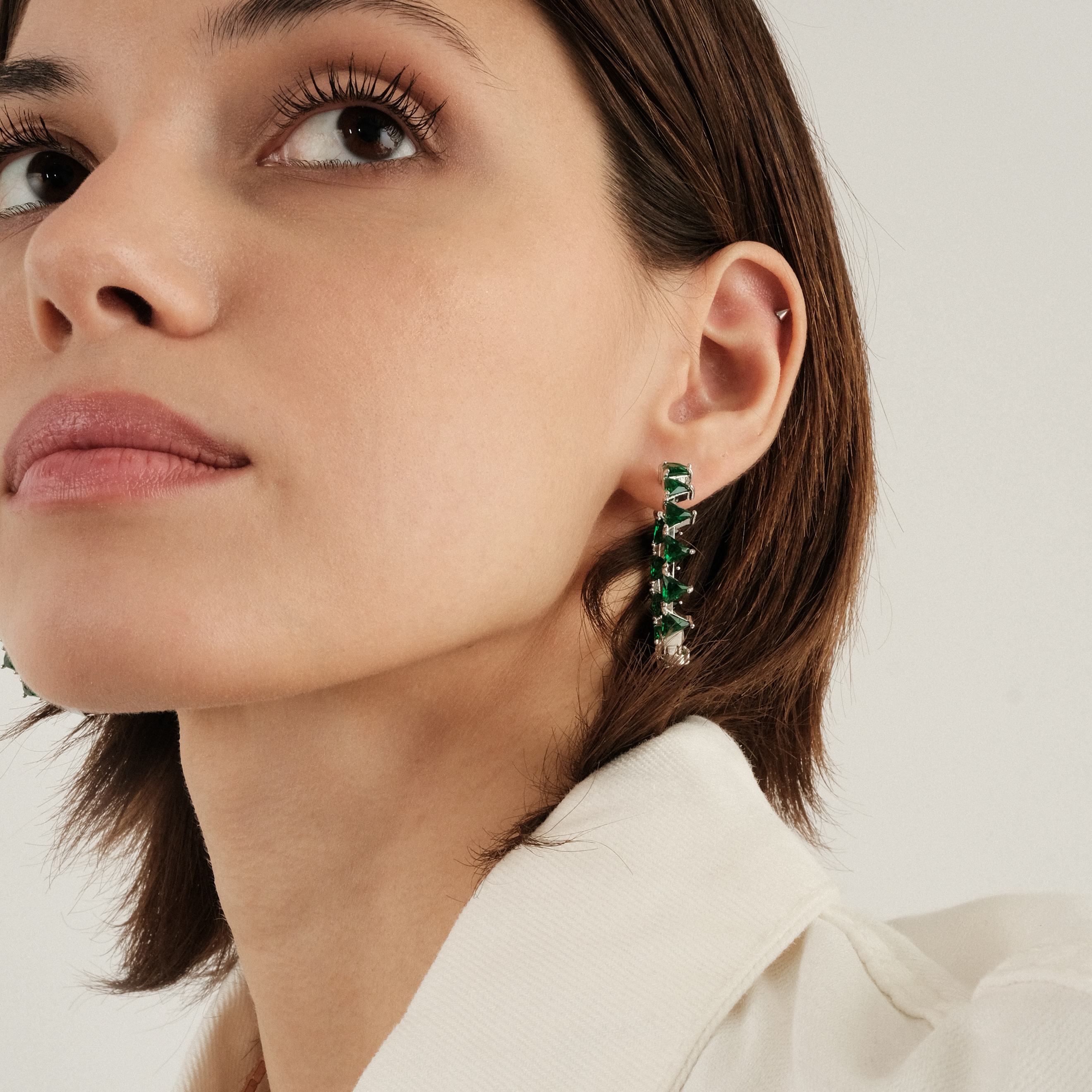 earrings with green triangular crystals