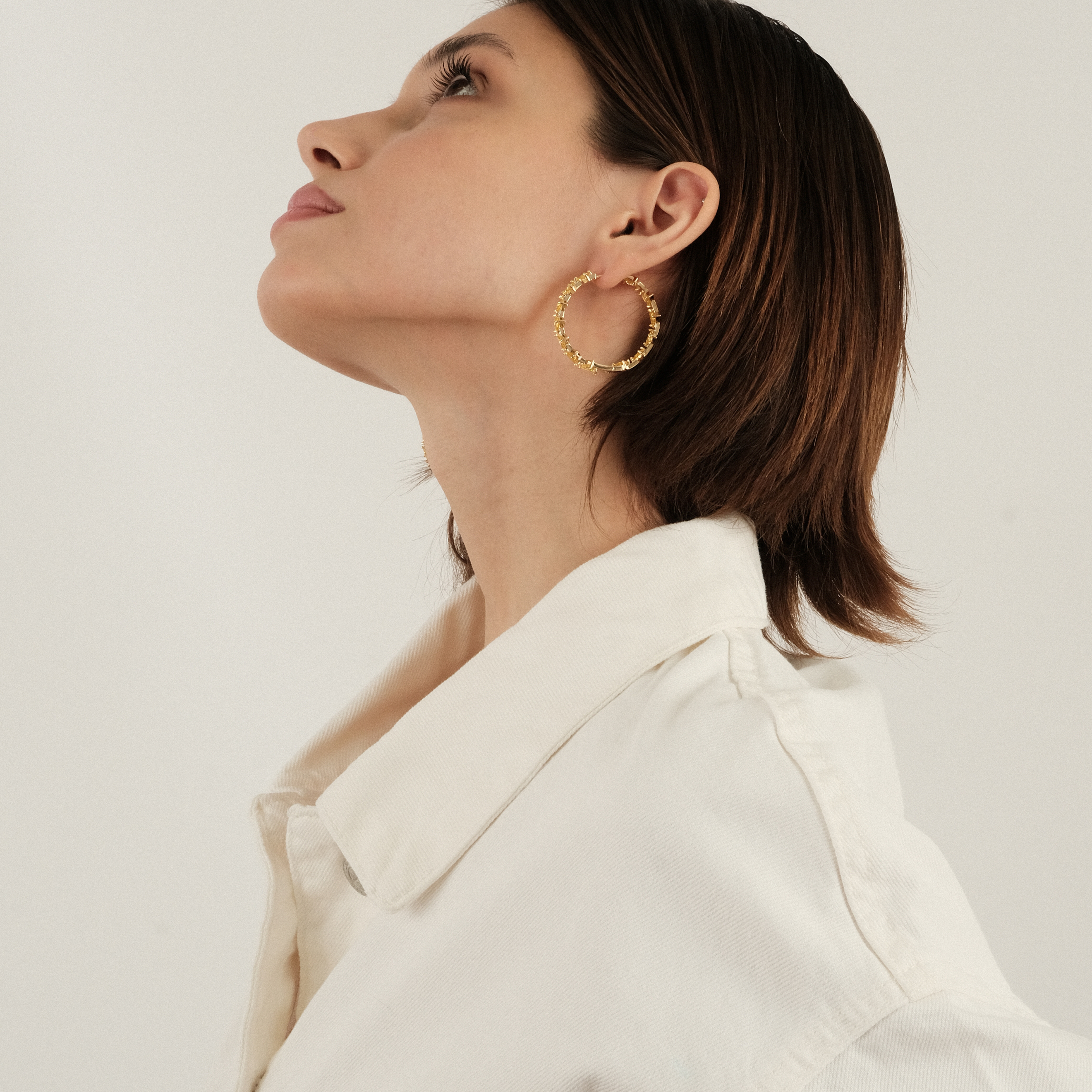 earrings with yellow triangular crystals