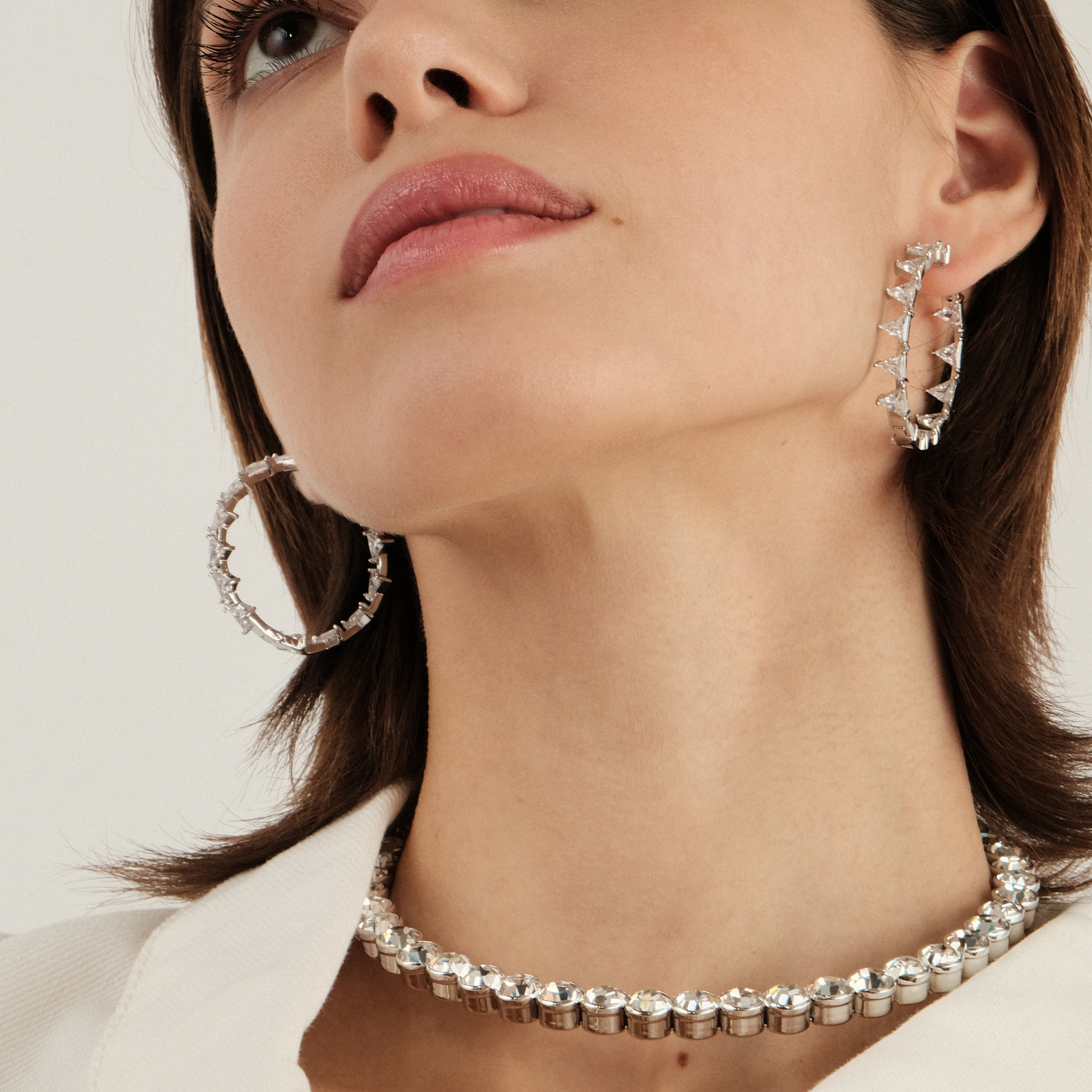 earrings with white triangular crystals