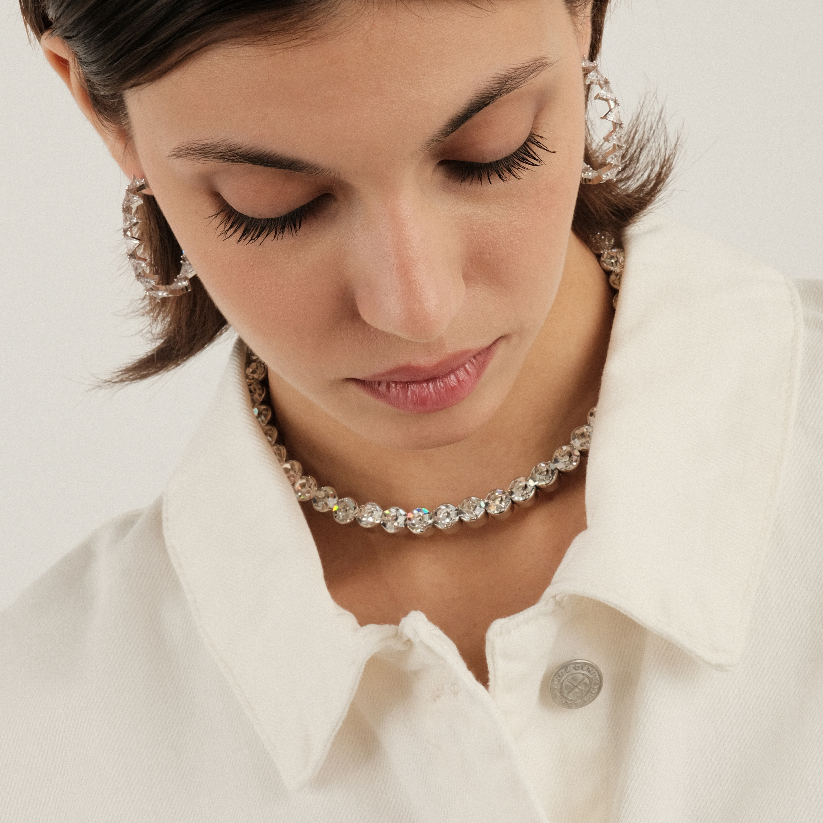 earrings with white triangular crystals