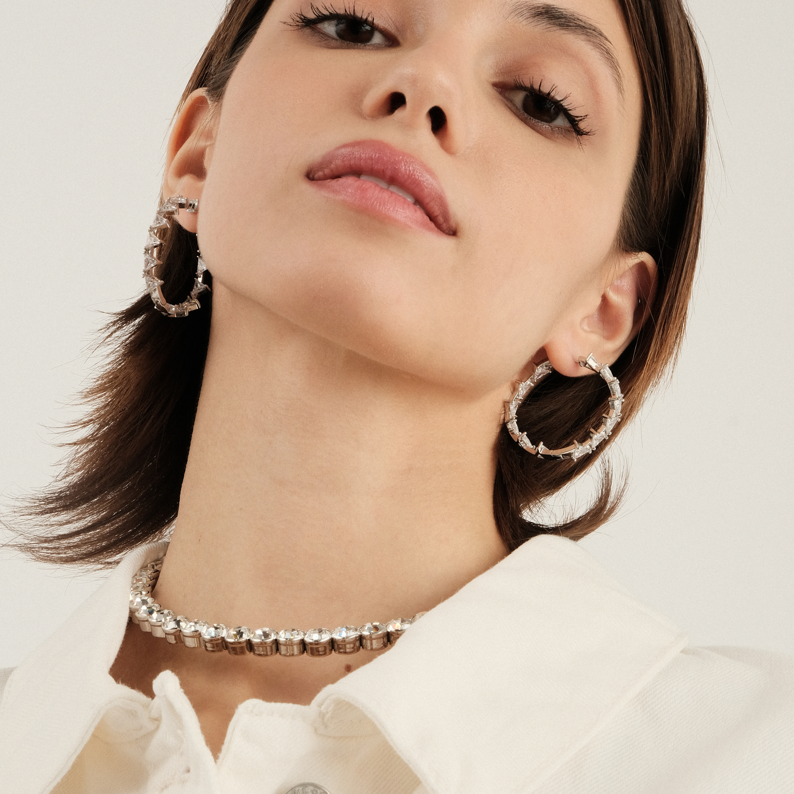earrings with white triangular crystals
