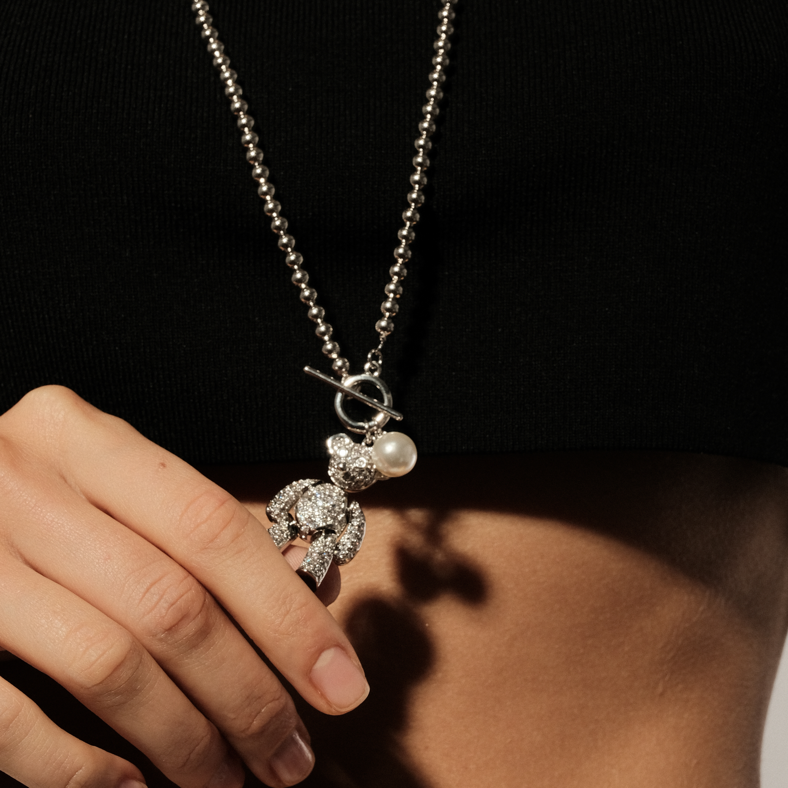 Long necklace with a bear pendant with crystals