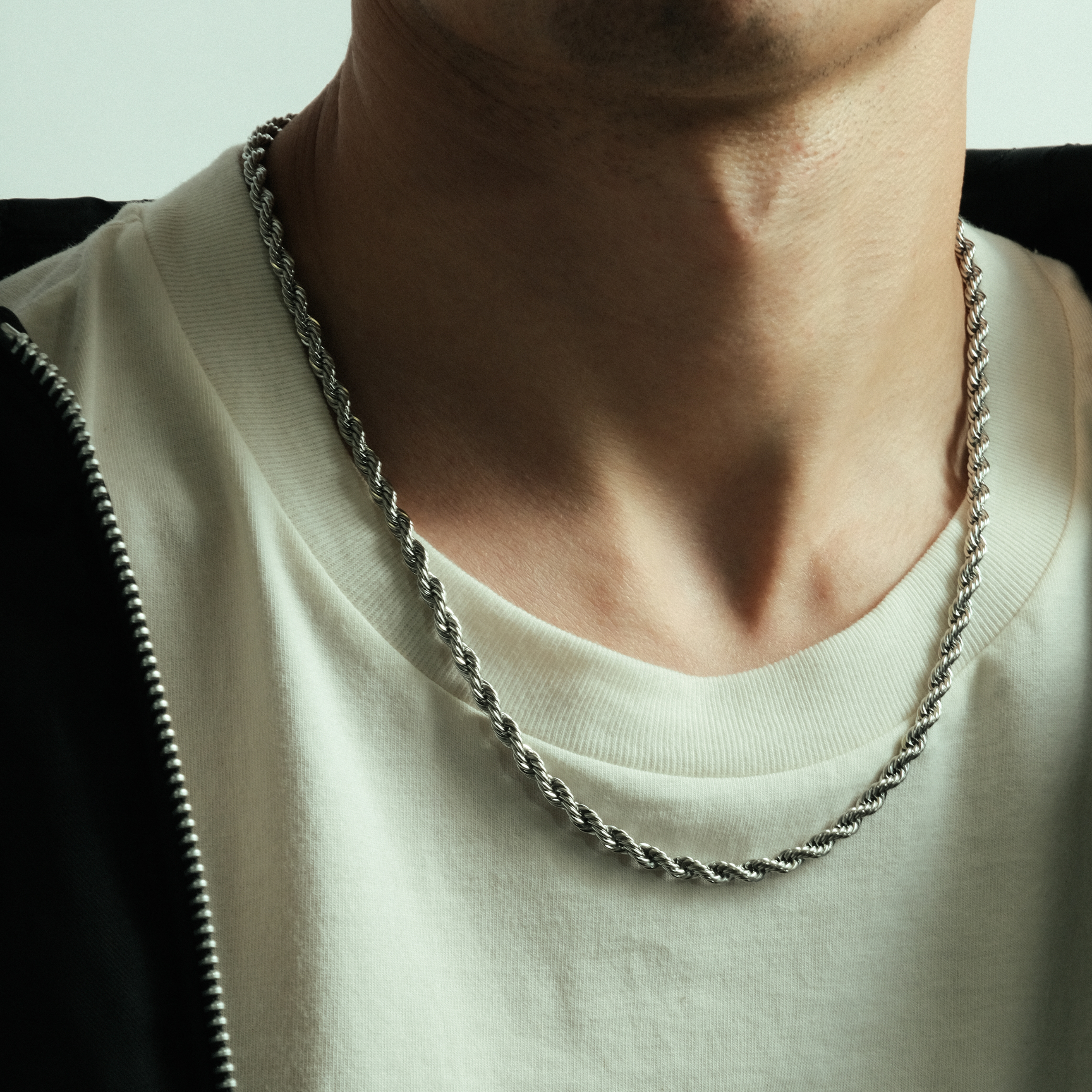 Steel chain with twisted weave