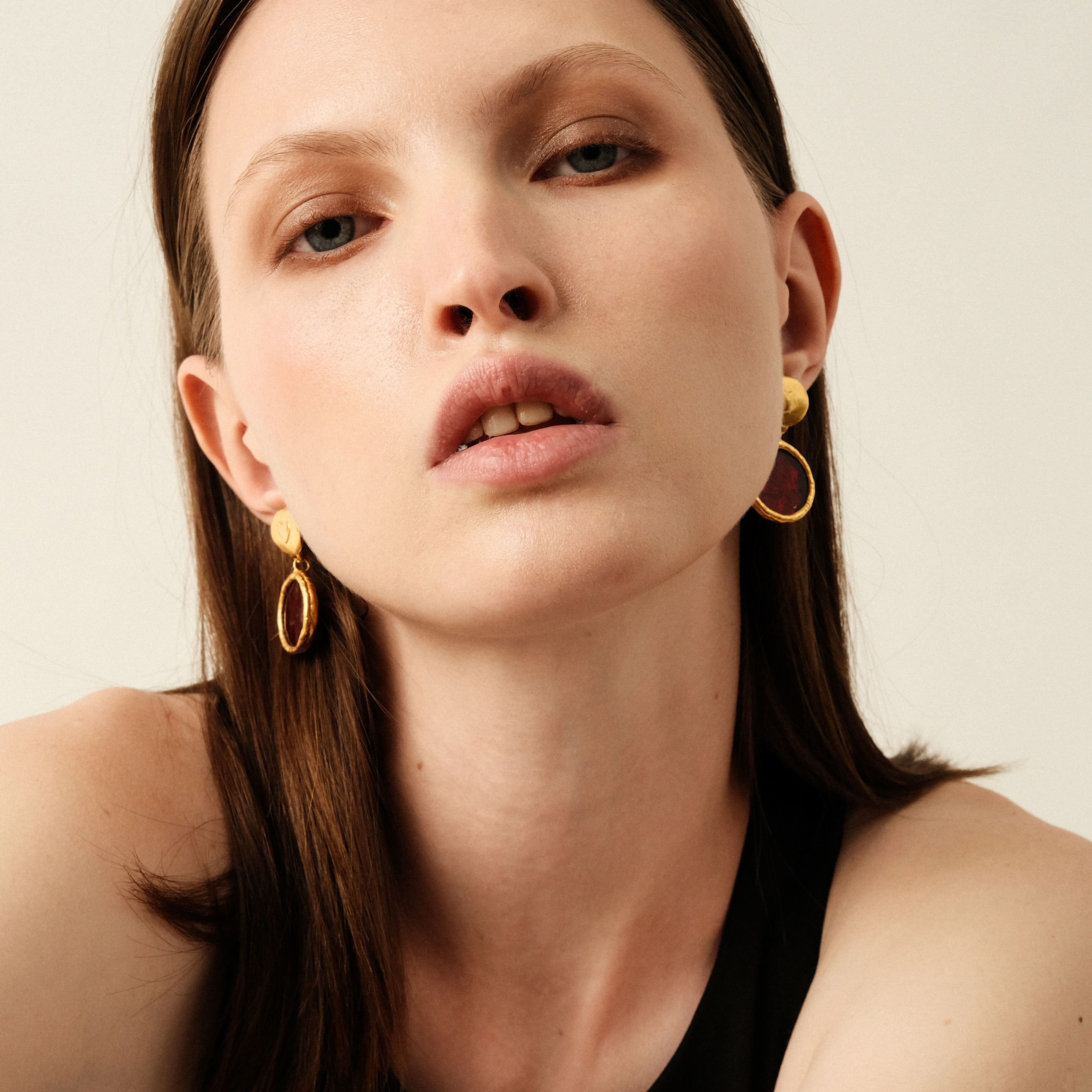 Gold-plated earrings with red enamel