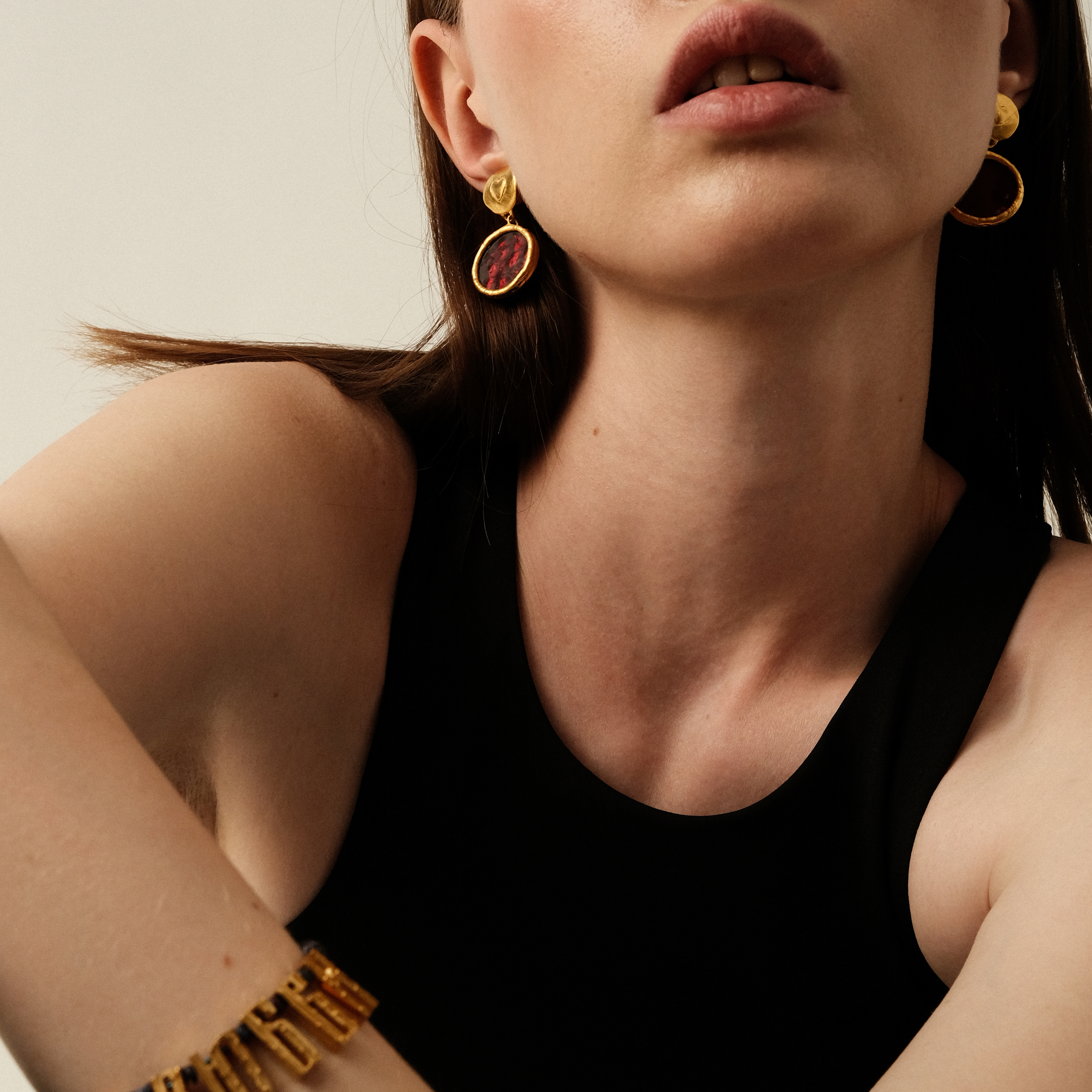 Gold-plated earrings with red enamel