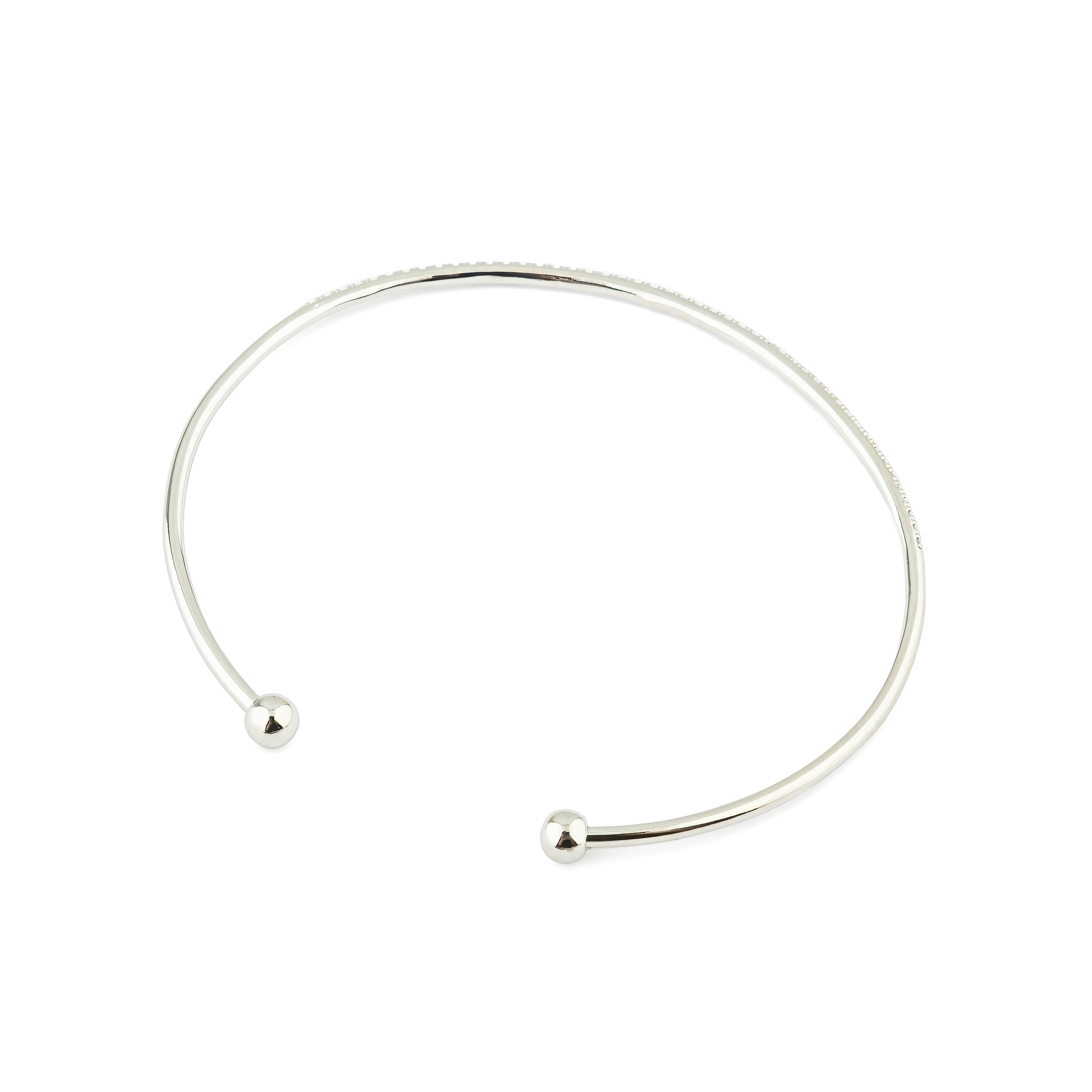 thin silver-tone bracelet with white crystals