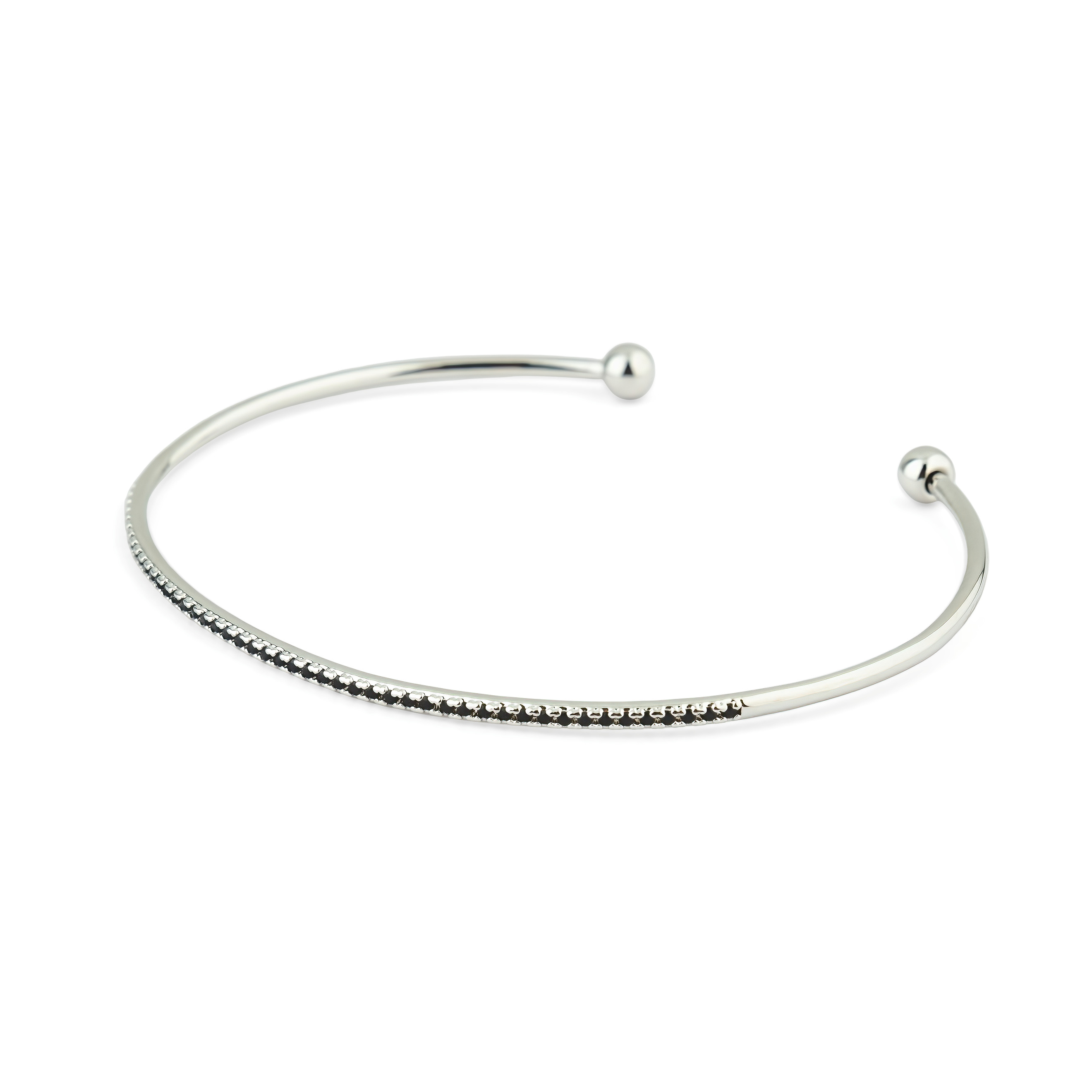 thin silver-tone bracelet with black crystals