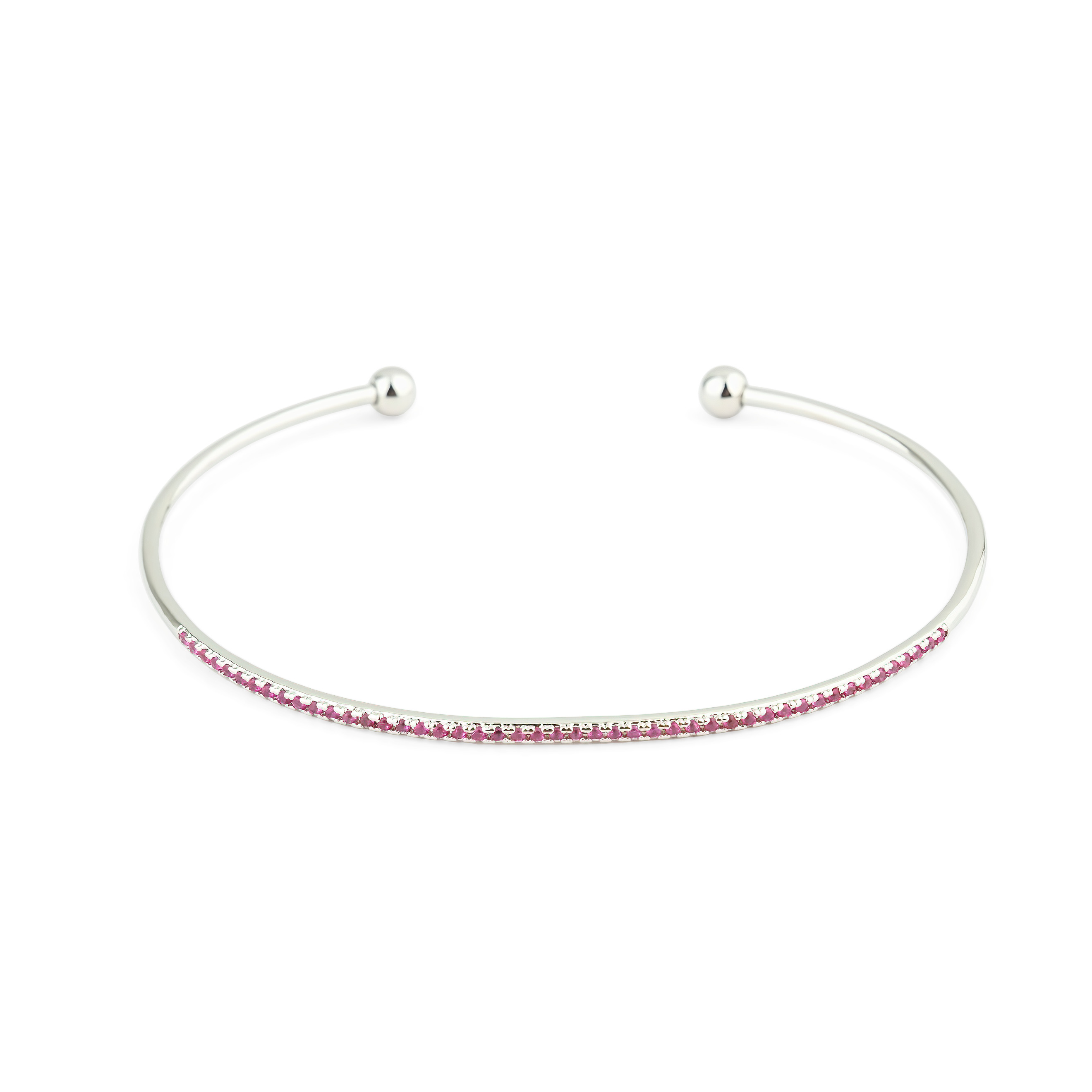 thin silver-tone bracelet with pink crystals