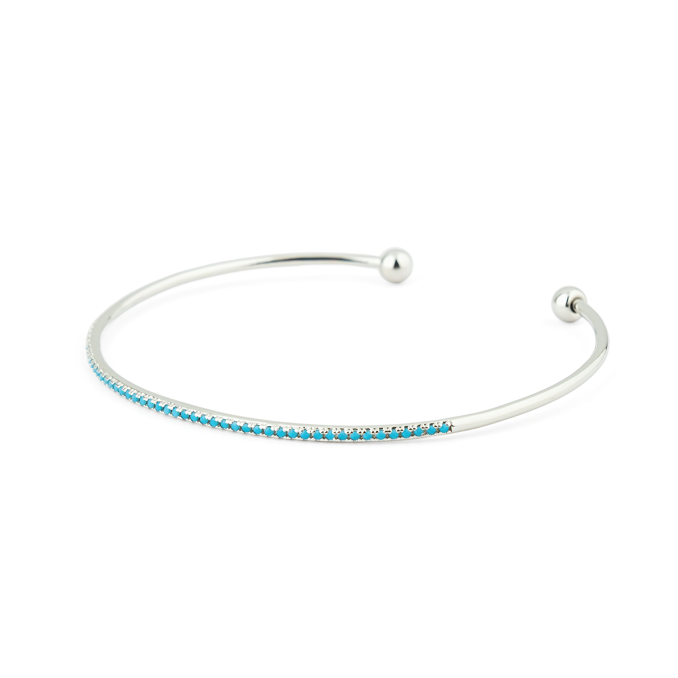 thin silver-tone bracelet with blue crystals