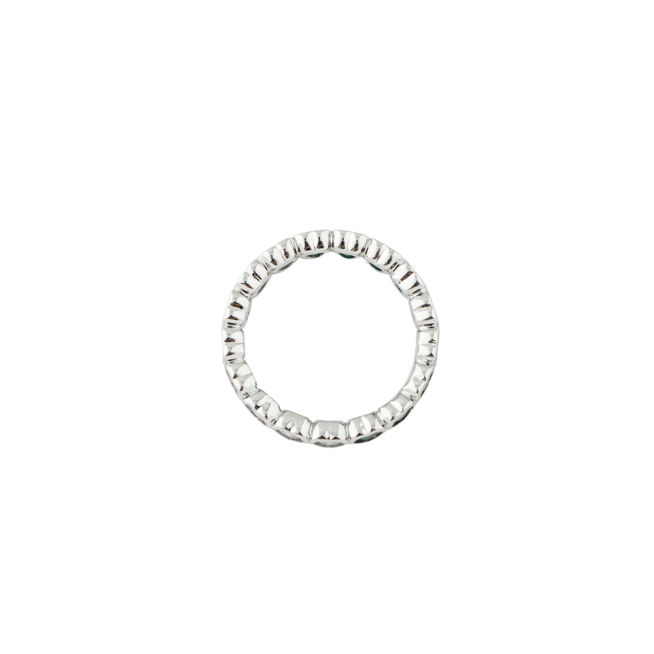 heart ring with white and green crystals