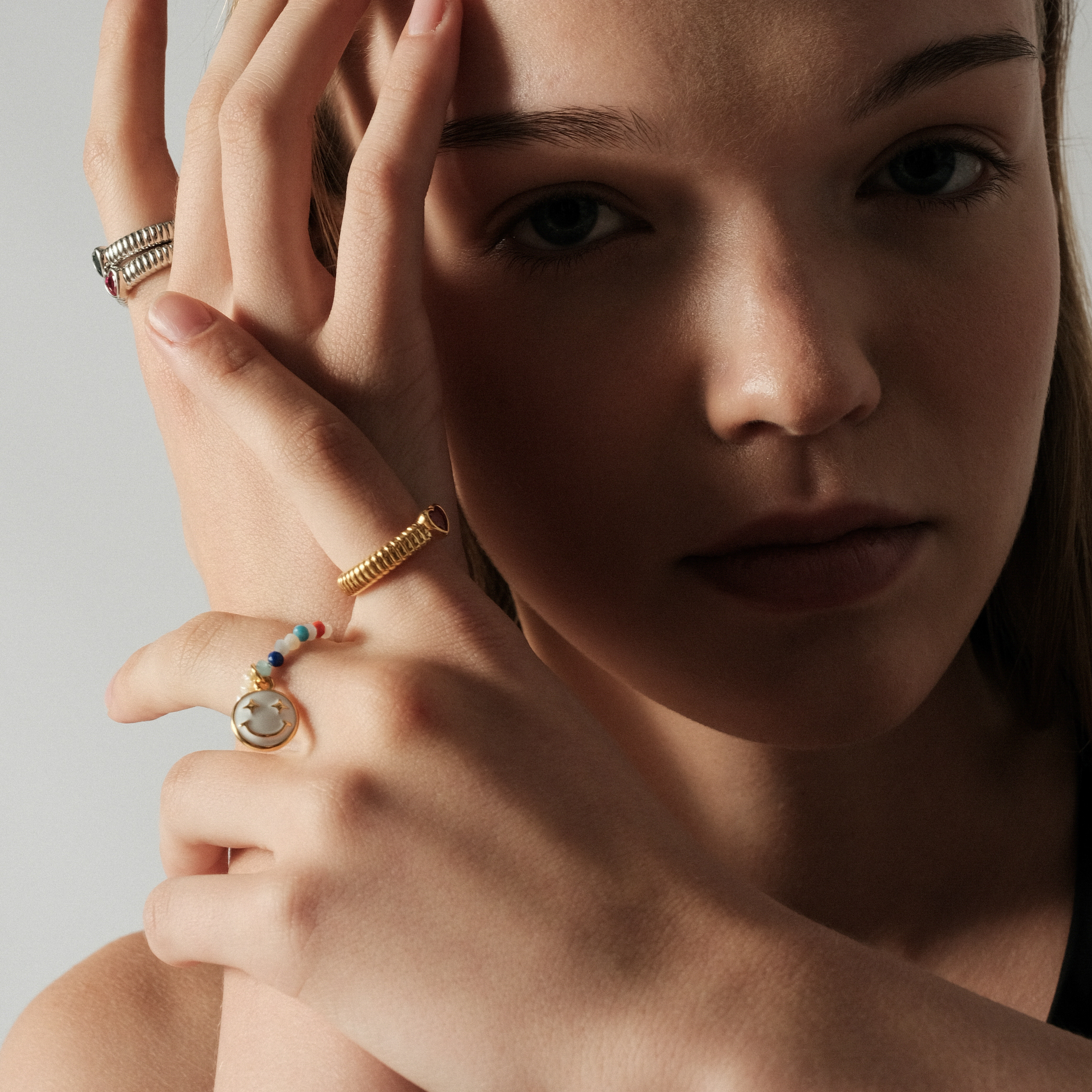 Сurly ring with a red heart