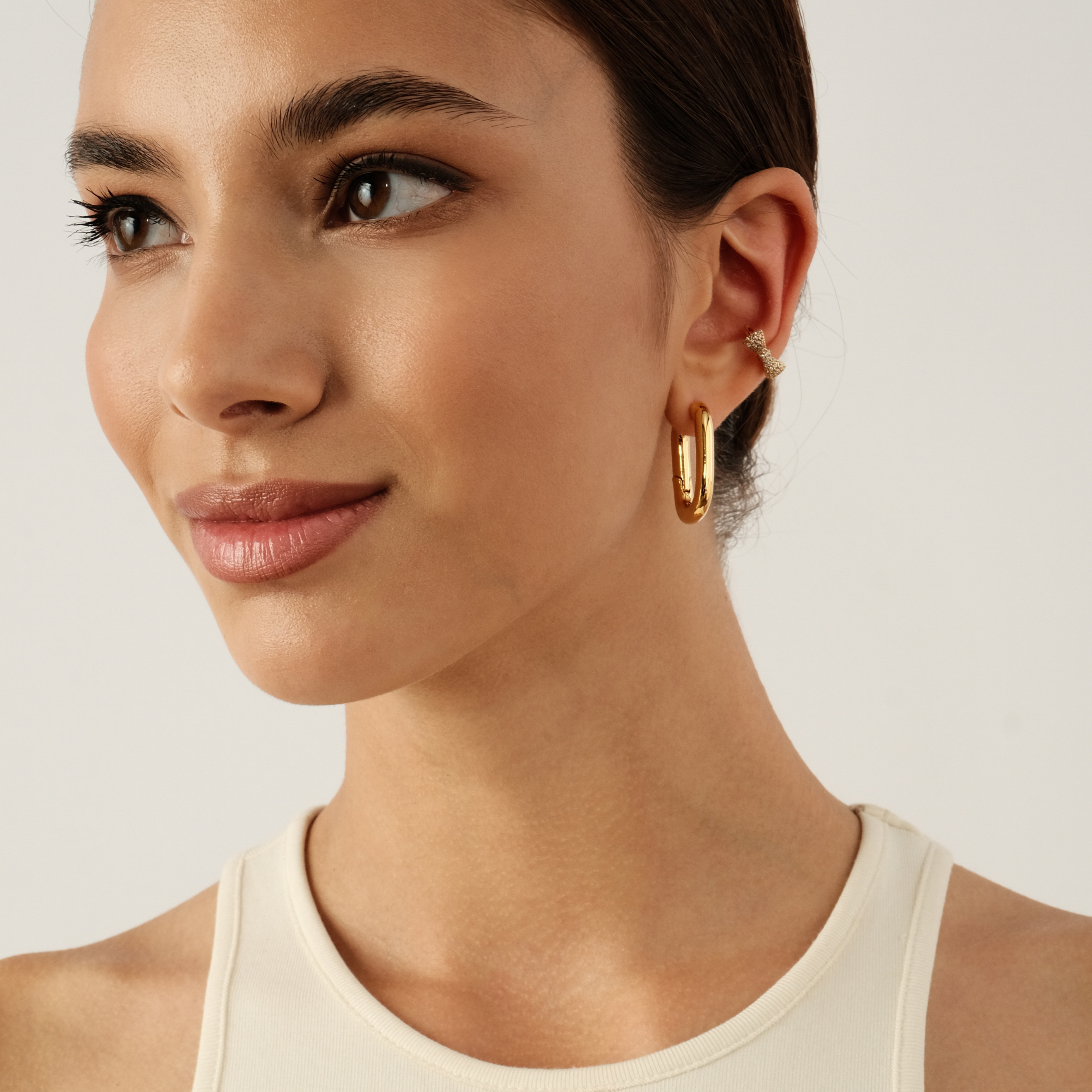 gold-tone bow cuff with crystals