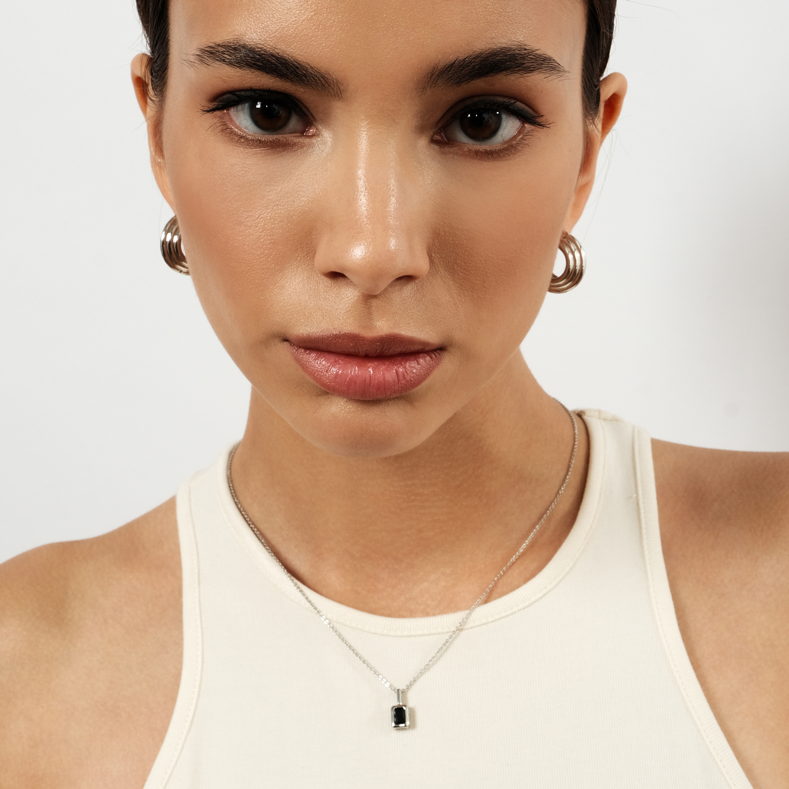Silver chain with black crystal
