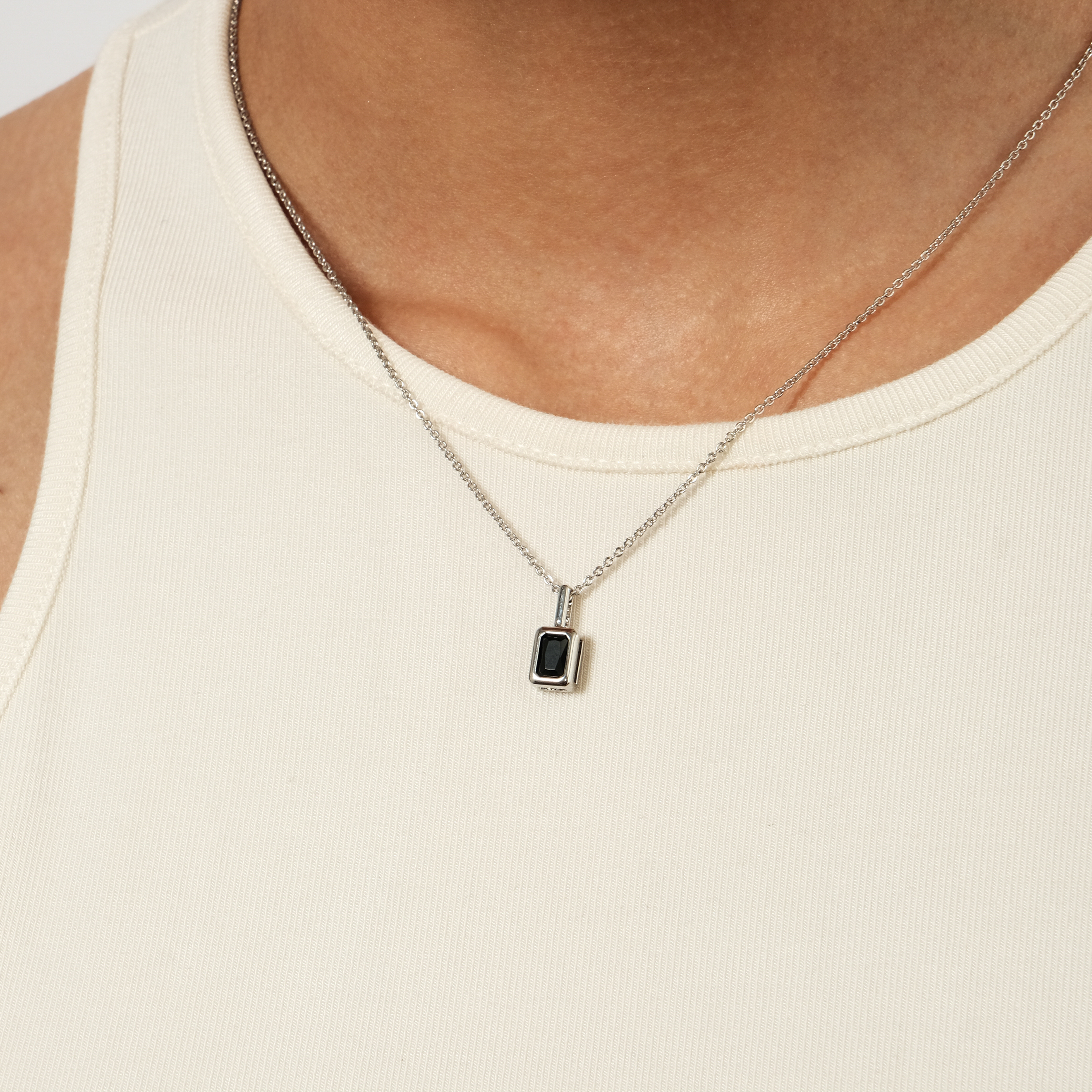 Silver chain with black crystal