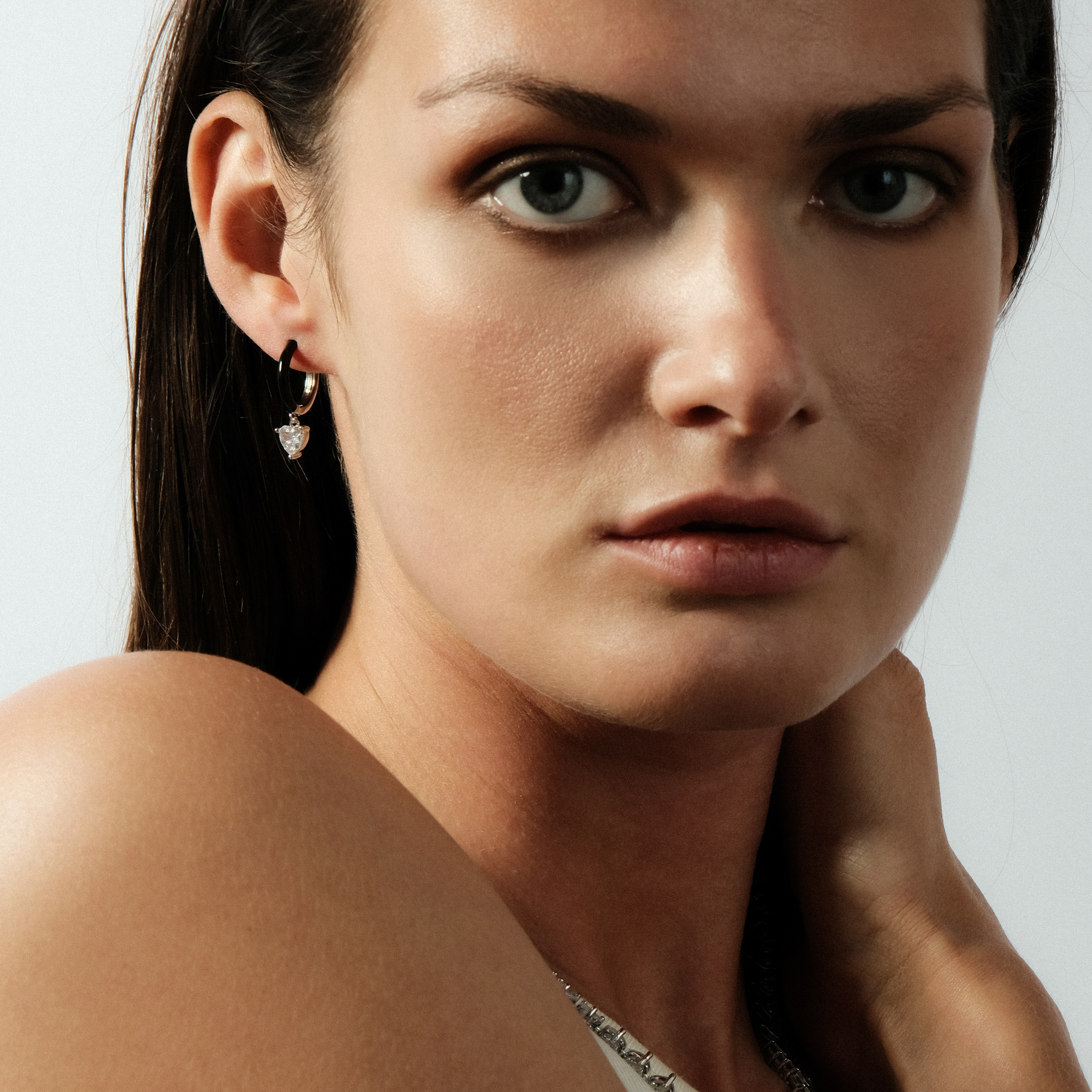 enamel earrings with a heart-cut pendant