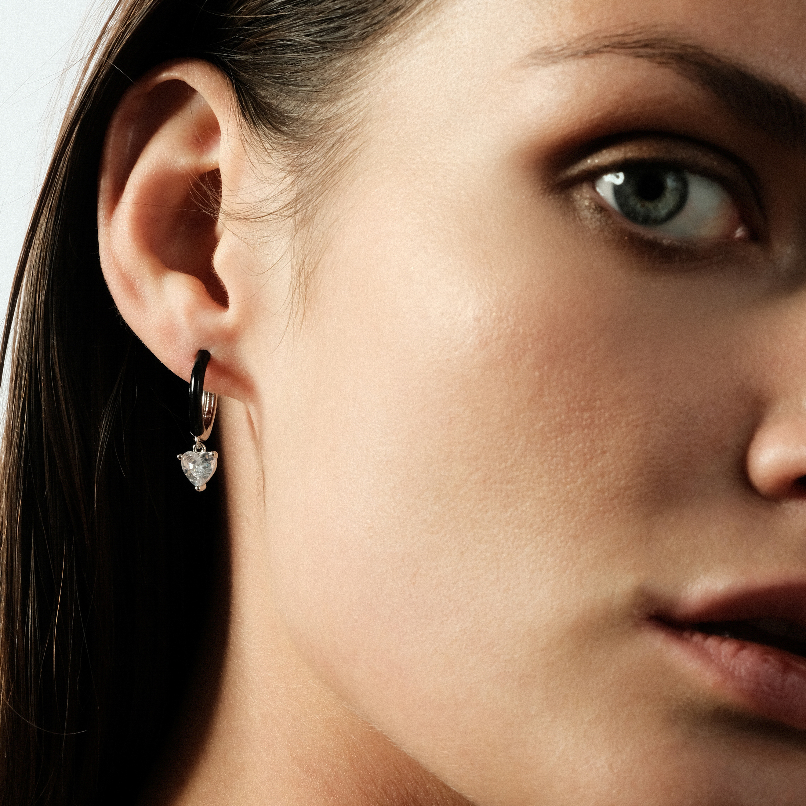 enamel earrings with a heart-cut pendant