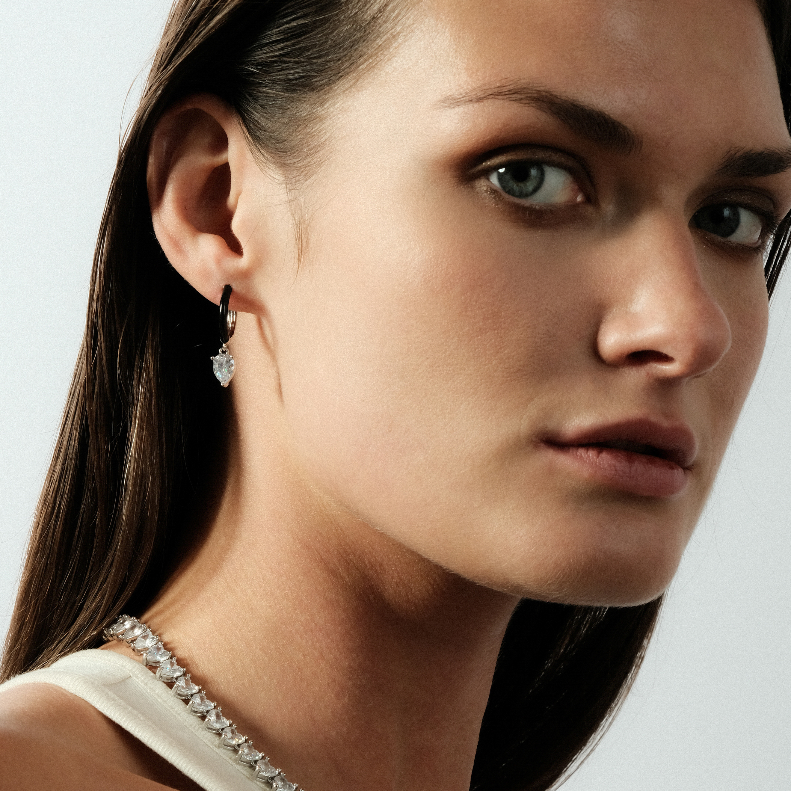 enamel earrings with oval cut pendant