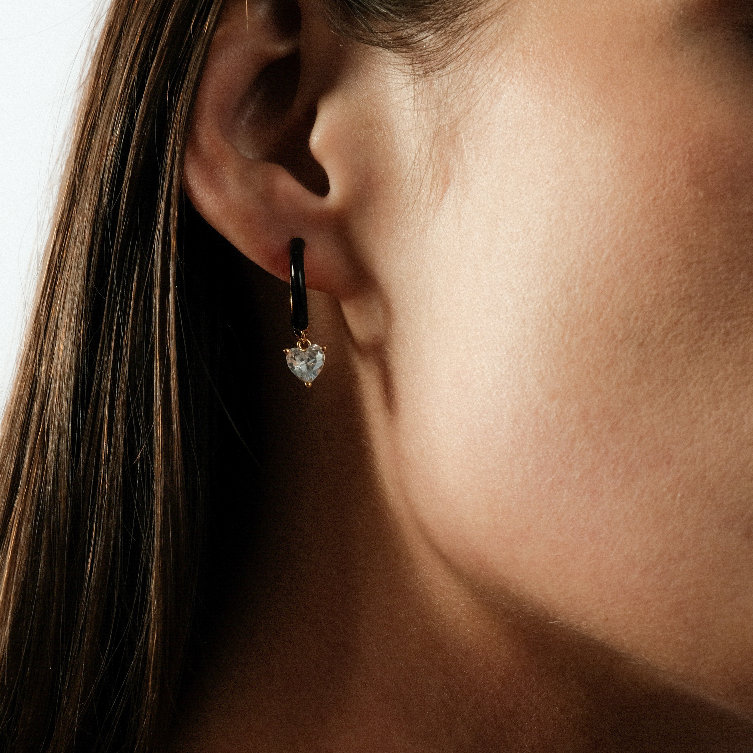 enamel earrings with a heart-cut pendant