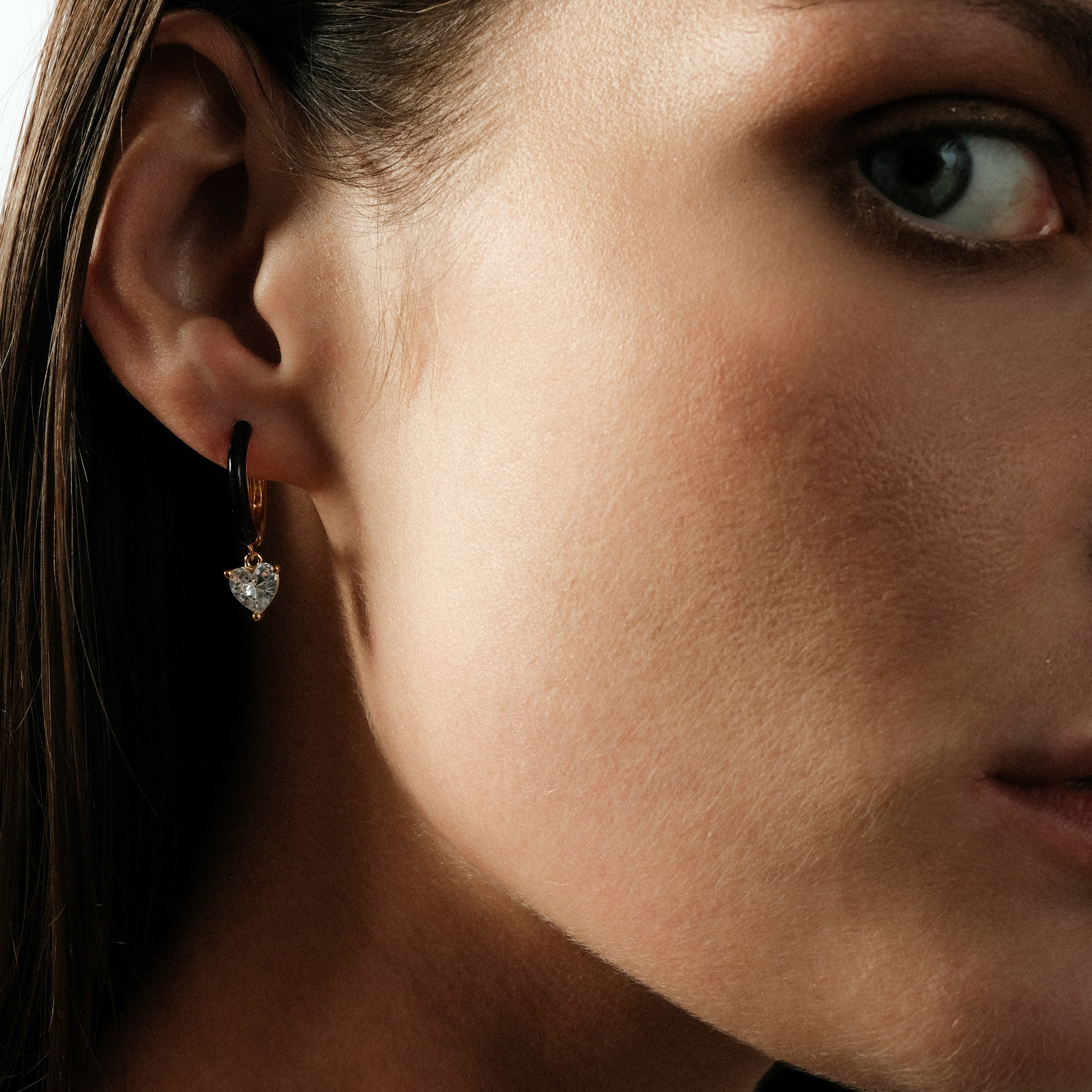 enamel earrings with a heart-cut pendant