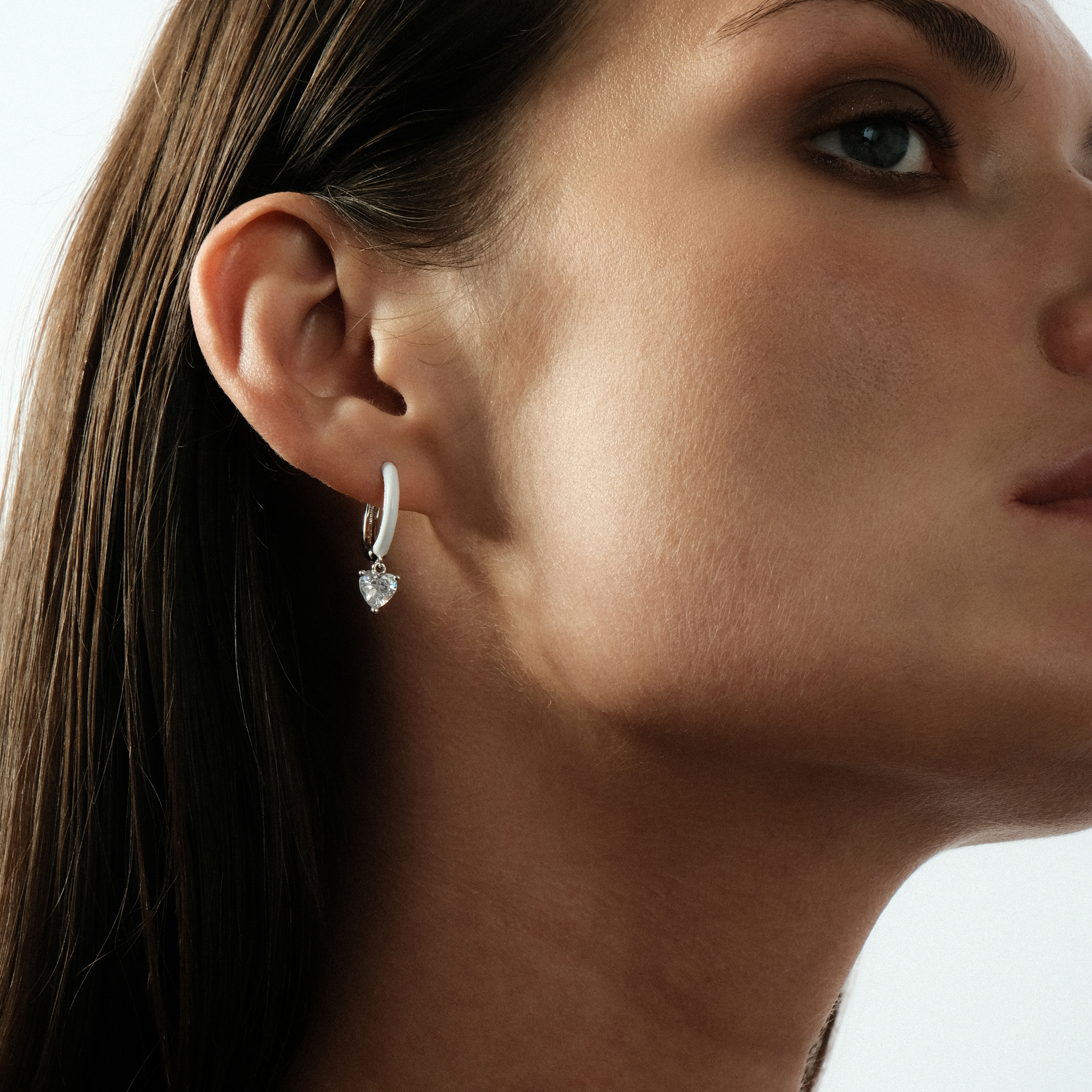 enamel earrings with a heart-cut pendant