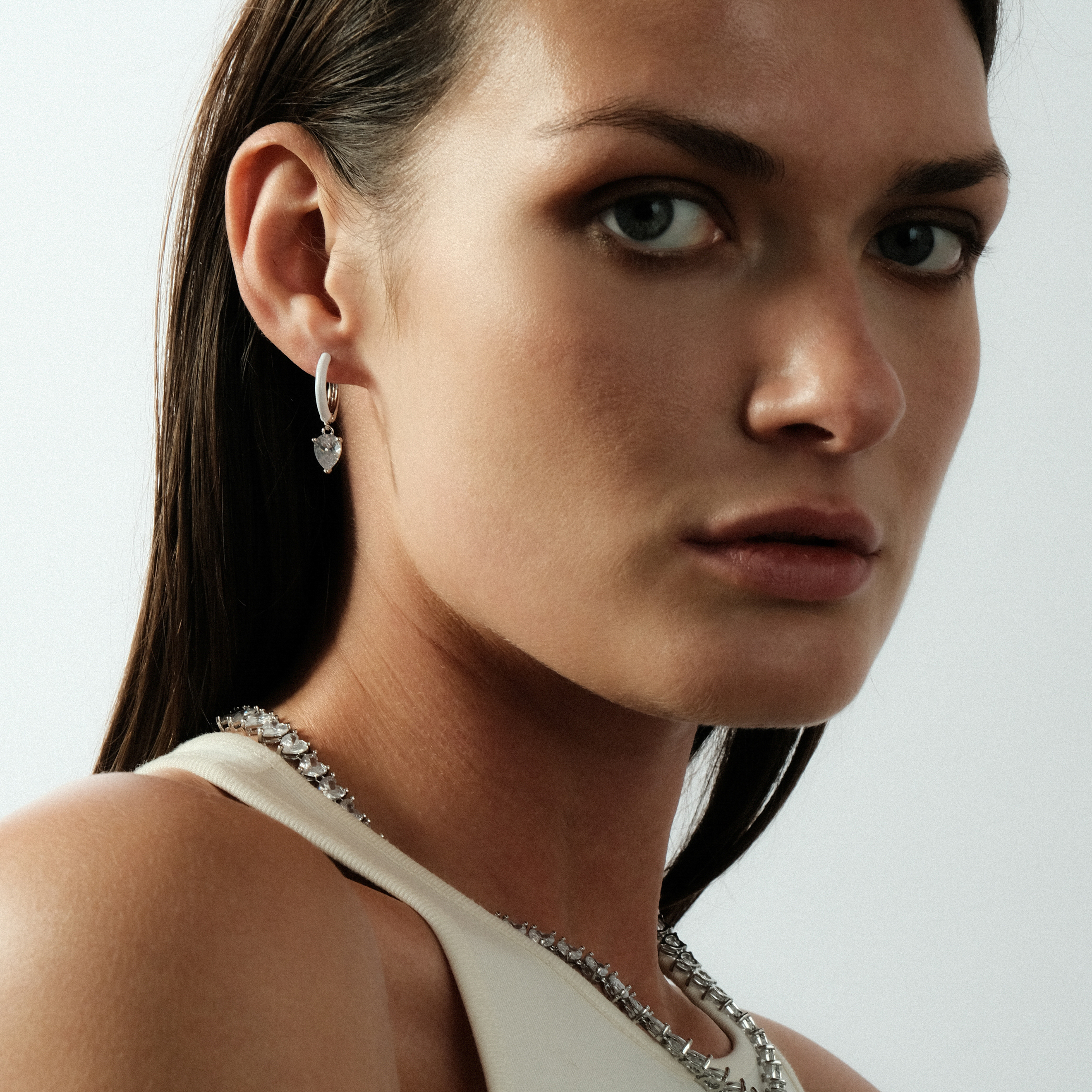 enamel earrings with a heart-cut pendant