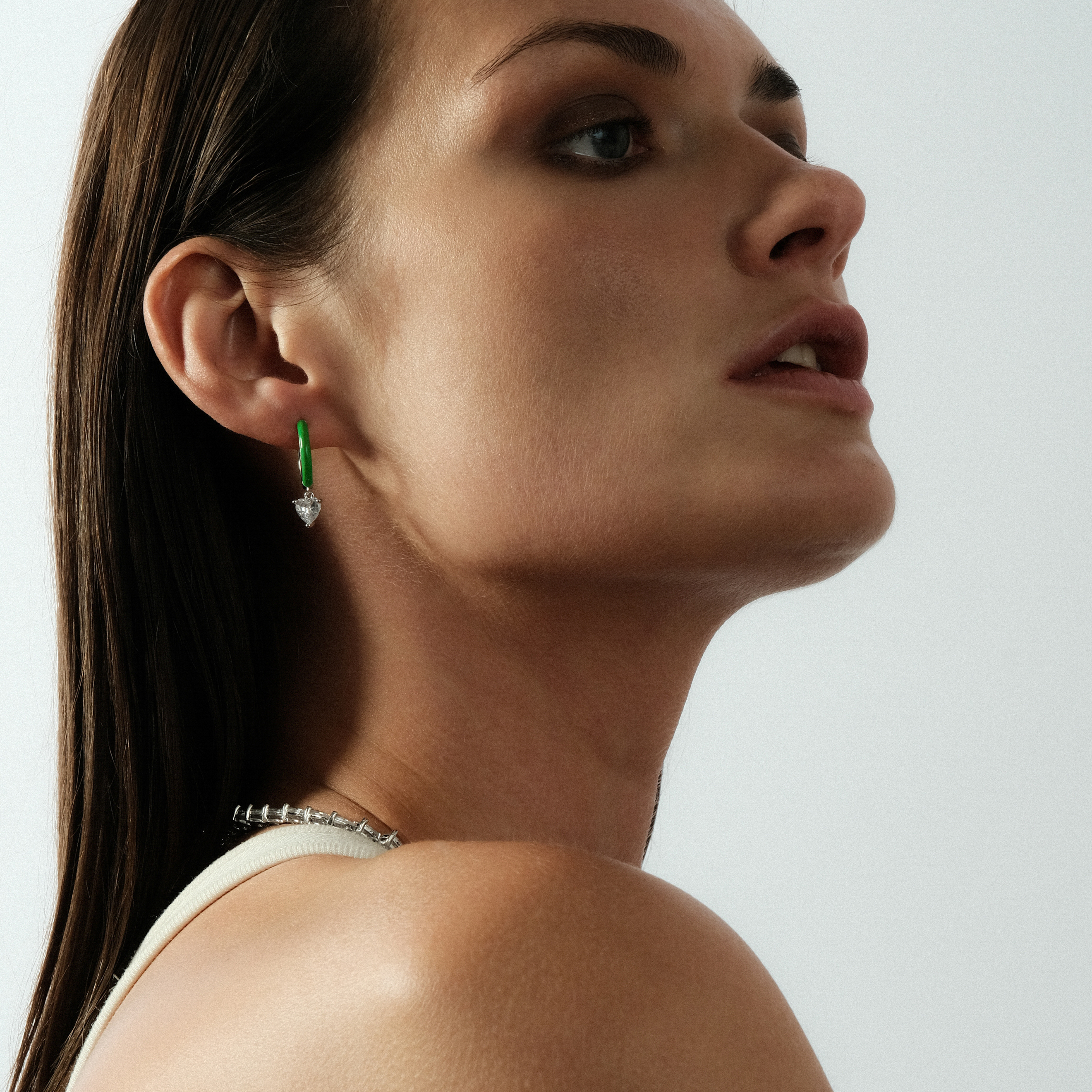 enamel earrings with a heart-cut pendant