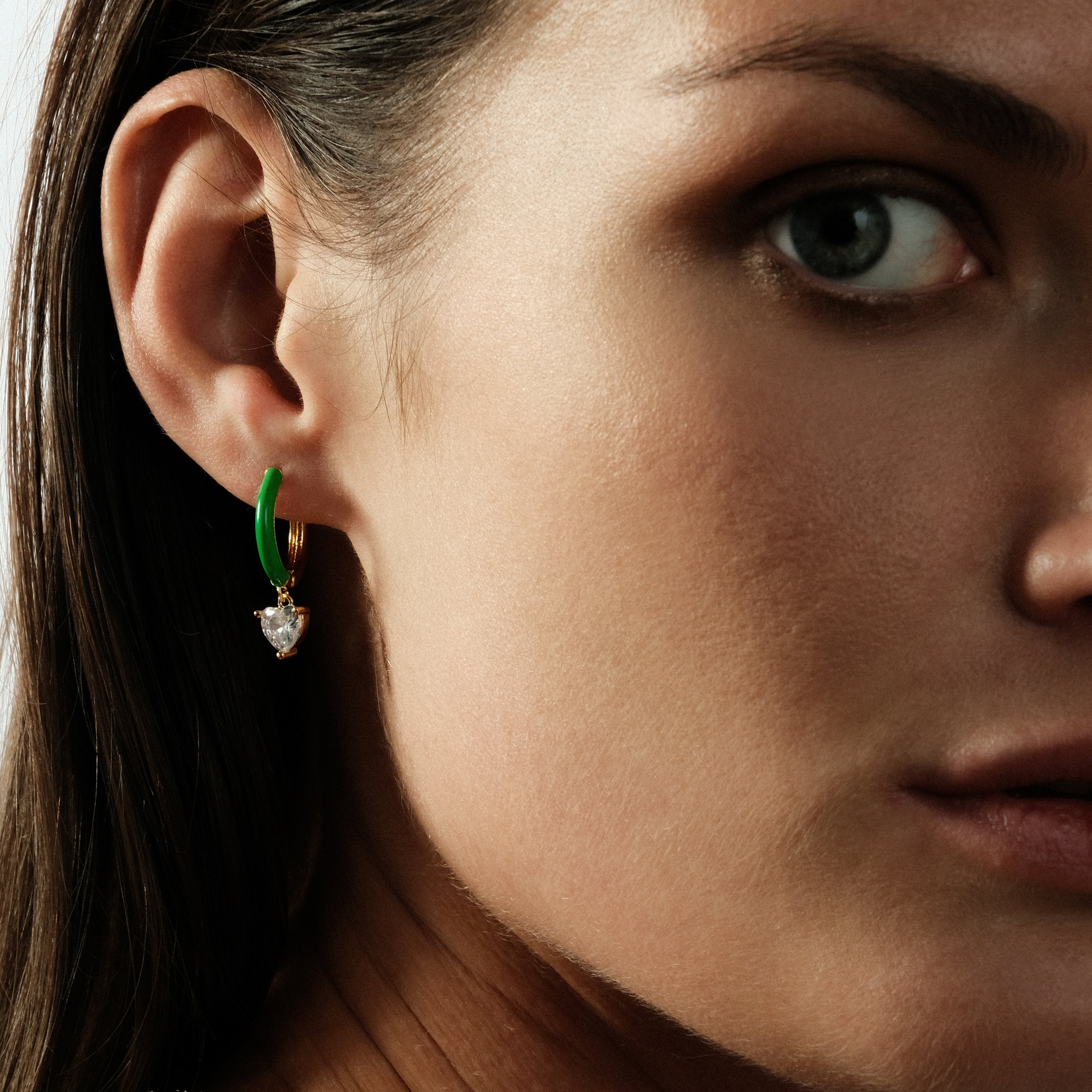 enamel earrings with a heart-cut pendant