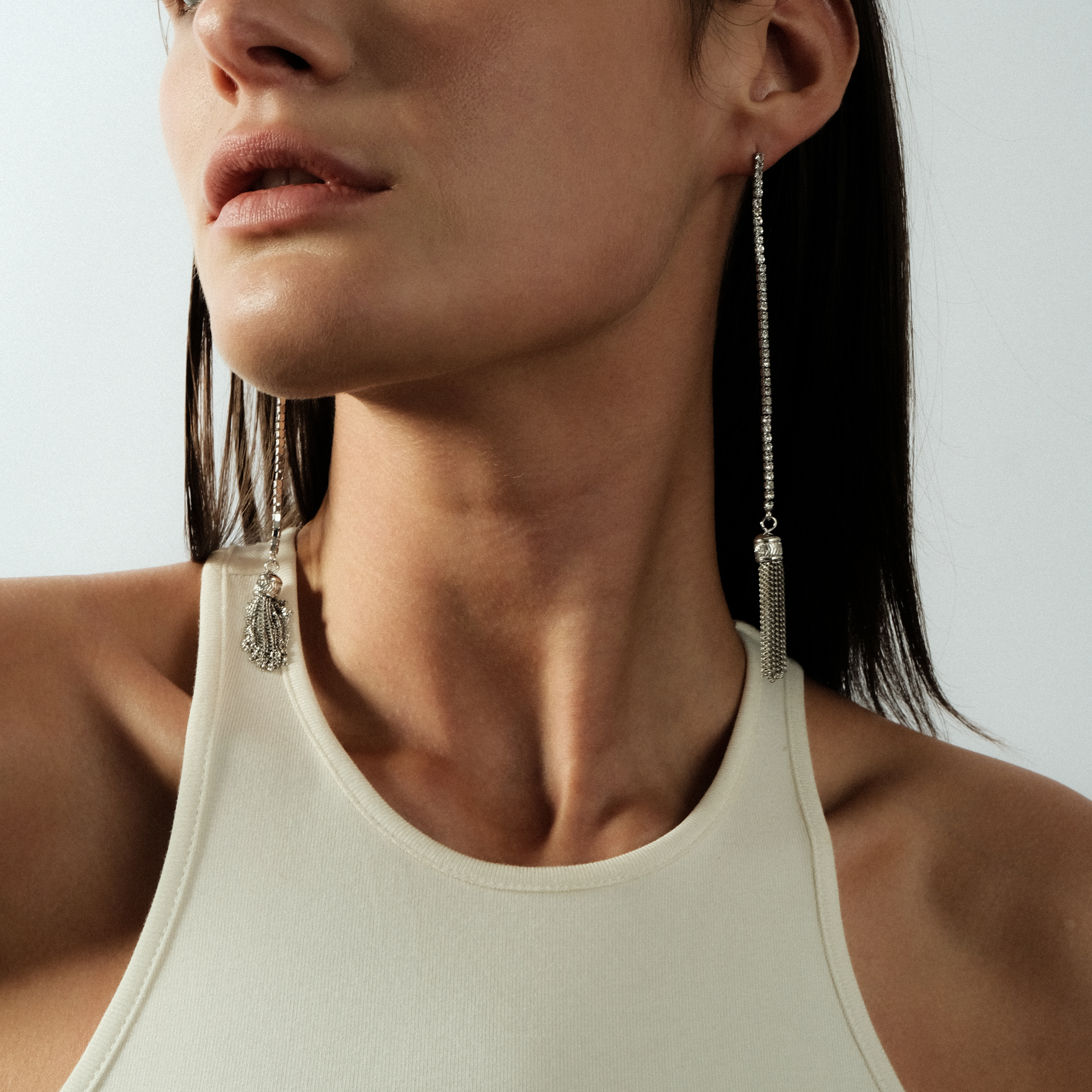 Silver earrings with tassels and crystals