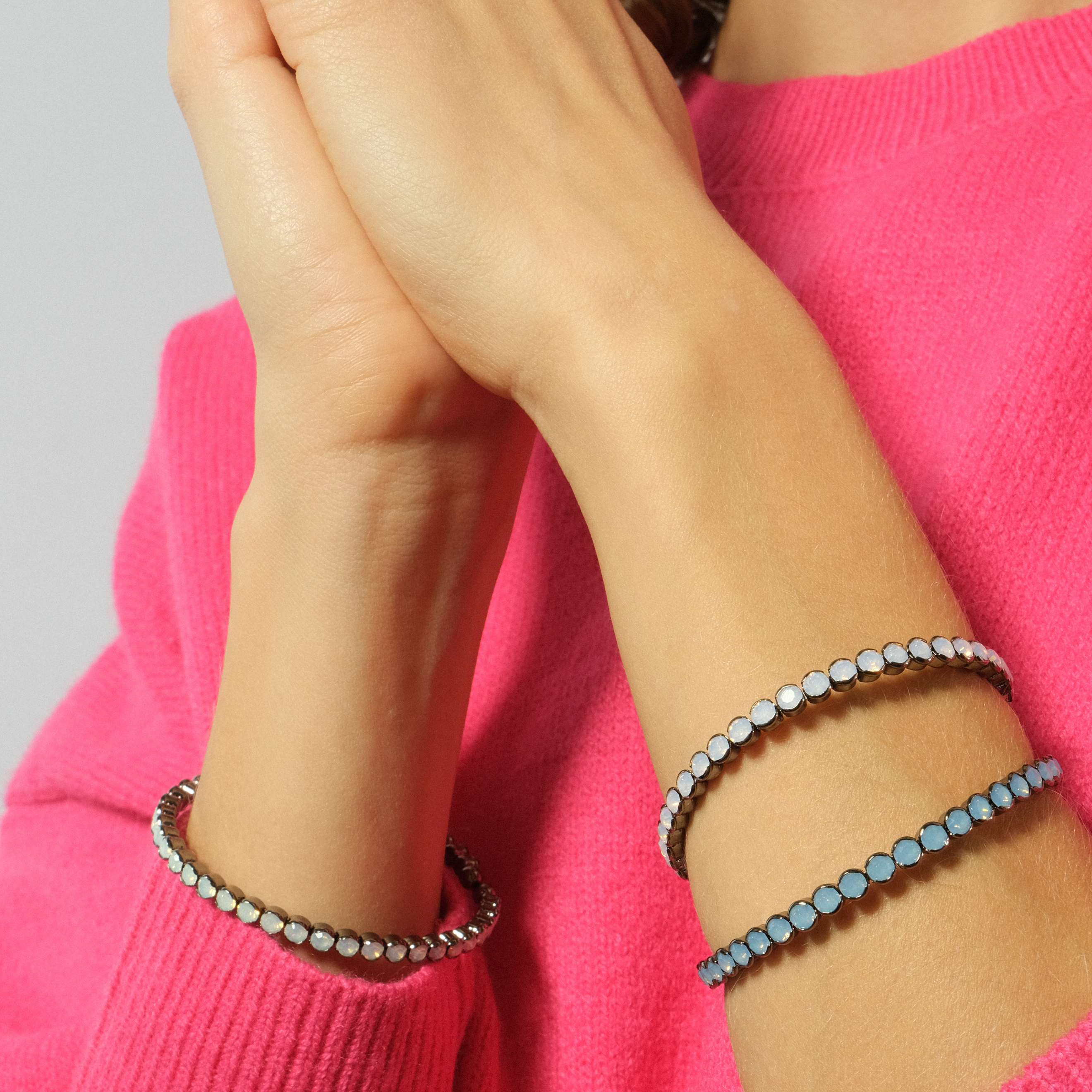 Silver open bracelet with pink crystals