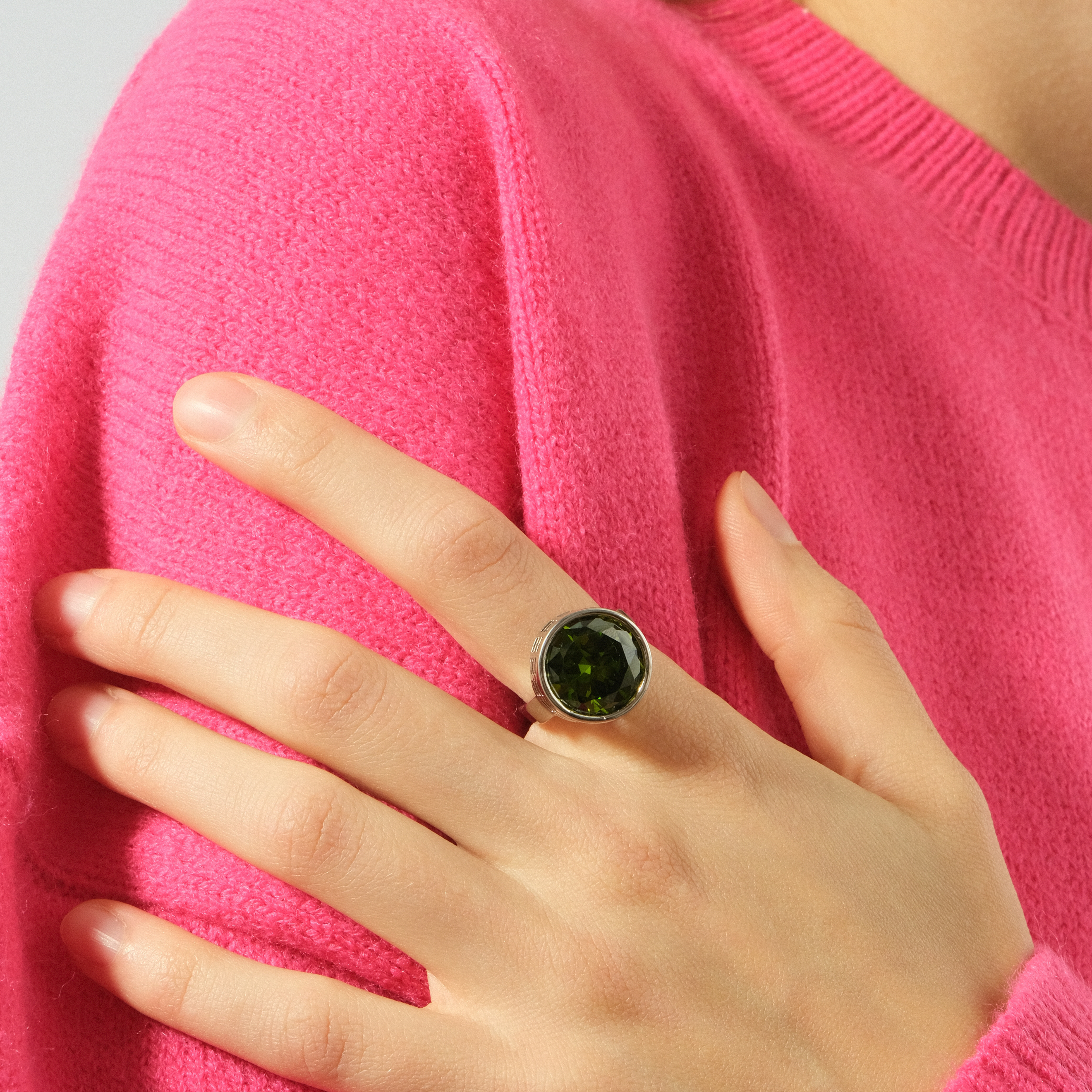 Silver ring with green stone